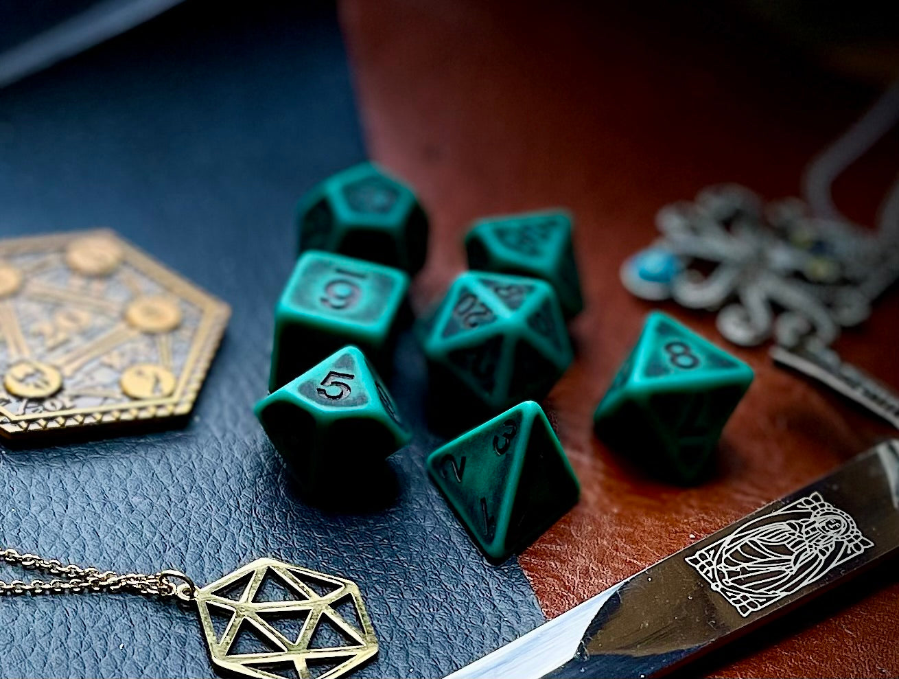Ancient Green stone effect resin polyhedral dice set. Yet another reason to add to your growing dice collection with these fantastic resin dice. They are standard 16mm polyhedral dice sets perfect for Tabletop games and RPG's such as pathfinder or dungeons and dragons. This set includes one of each D20, D12, D10, D%, D8, D6, D4.