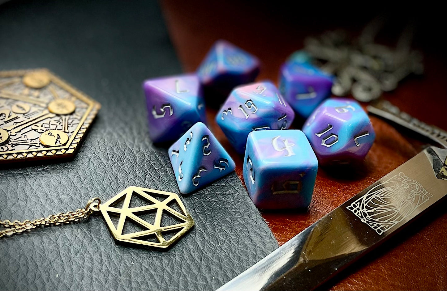 Anemone Polyhedral Dice Set Roll with style with these bubblegum pink and blue marbled resin polyhedral dice set. They are standard 16mm polyhedral dice sets perfect for Tabletop games and RPG's such as pathfinder or dungeons and dragons. This set includes one of each D20, D12, D10, D%, D8, D6, D4.