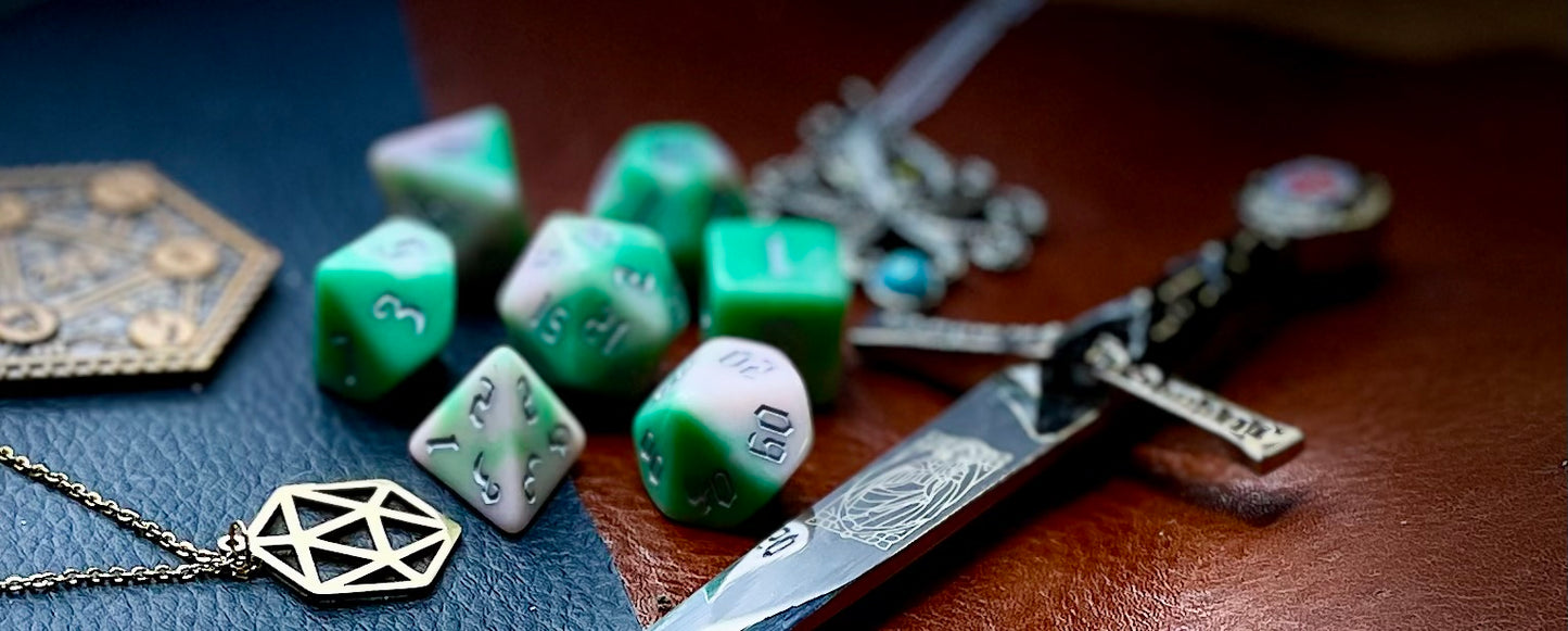Elemental chaos green and white resin polyhedral dice set. Unleash the fury of the earth elemental spirits with these fantastic resin dice. Combining green and white swirls; each dice has its own unique pattern.