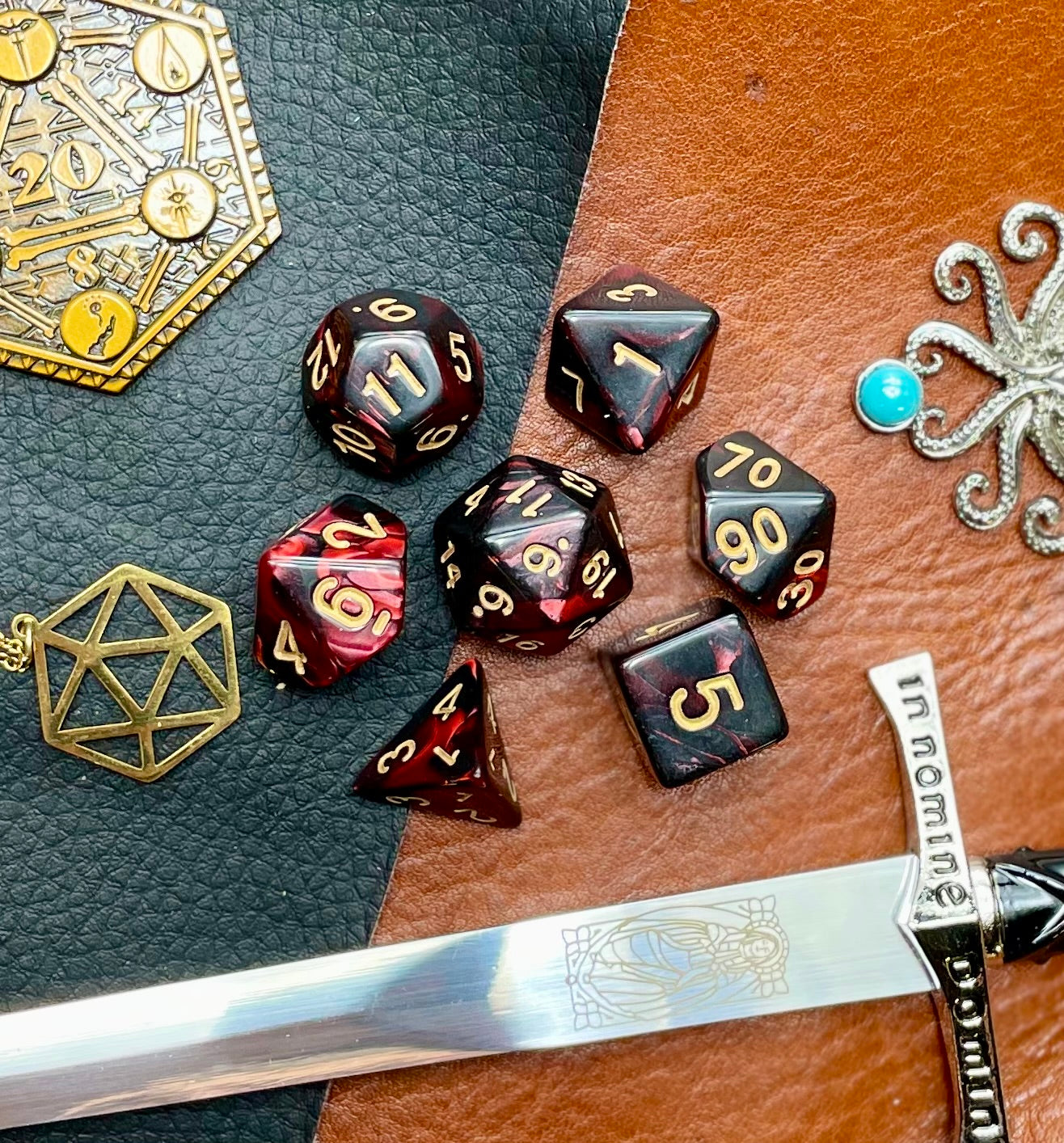 Elemental dark red and black resin polyhedral dice set. Harness the power of the fire elemental spirits with these fantastic resin dice. Combining dark red and black swirls, each dice has its own unique pattern. They are standard 16mm polyhedral dice sets perfect for Tabletop games and RPG's such as pathfinder or dungeons and dragons. This set includes one of each D20, D12, D10, D%, D8, D6, D4.