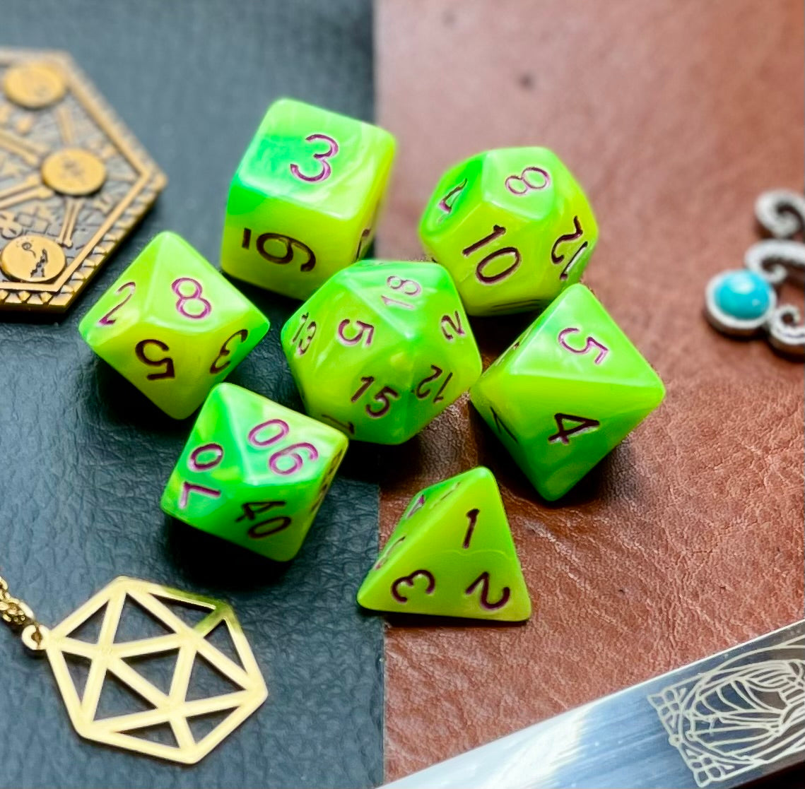 Elemental Yellow and Green resin polyhedral dice set. Awaken the elements with these fantastic resin dice. Combining vibrant yellow and green swirls; each dice has its own unique pattern. They are standard 16mm polyhedral dice sets perfect for Tabletop games and RPG's such as pathfinder or dungeons and dragons. This set includes one of each D20, D12, D10, D%, D8, D6, D4.