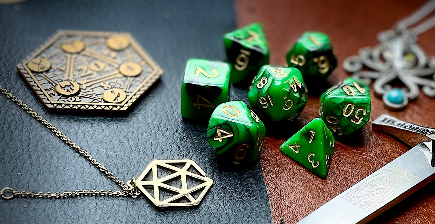 Elemental green and black resin polyhedral dice set. Unleash the fury of the earth elemental spirits with these fantastic resin dice. Combining green and black swirls; each dice has its own unique pattern.