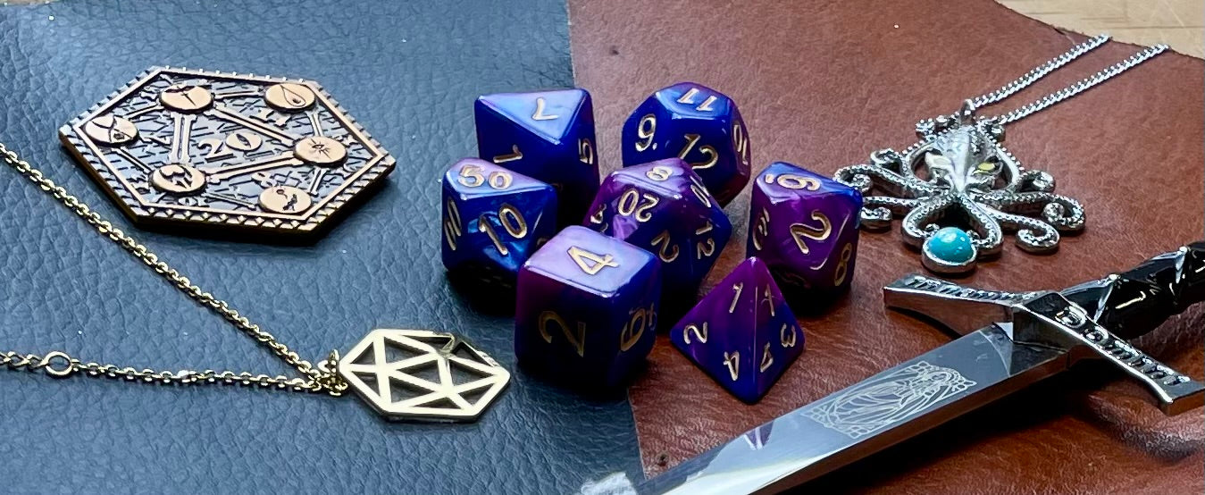 Elemental purple and blue resin polyhedral dice set. Harness the power of the air and water elemental spirits with these fantastic resin dice. Combining blue and copper swirls, each dice has its own unique pattern.