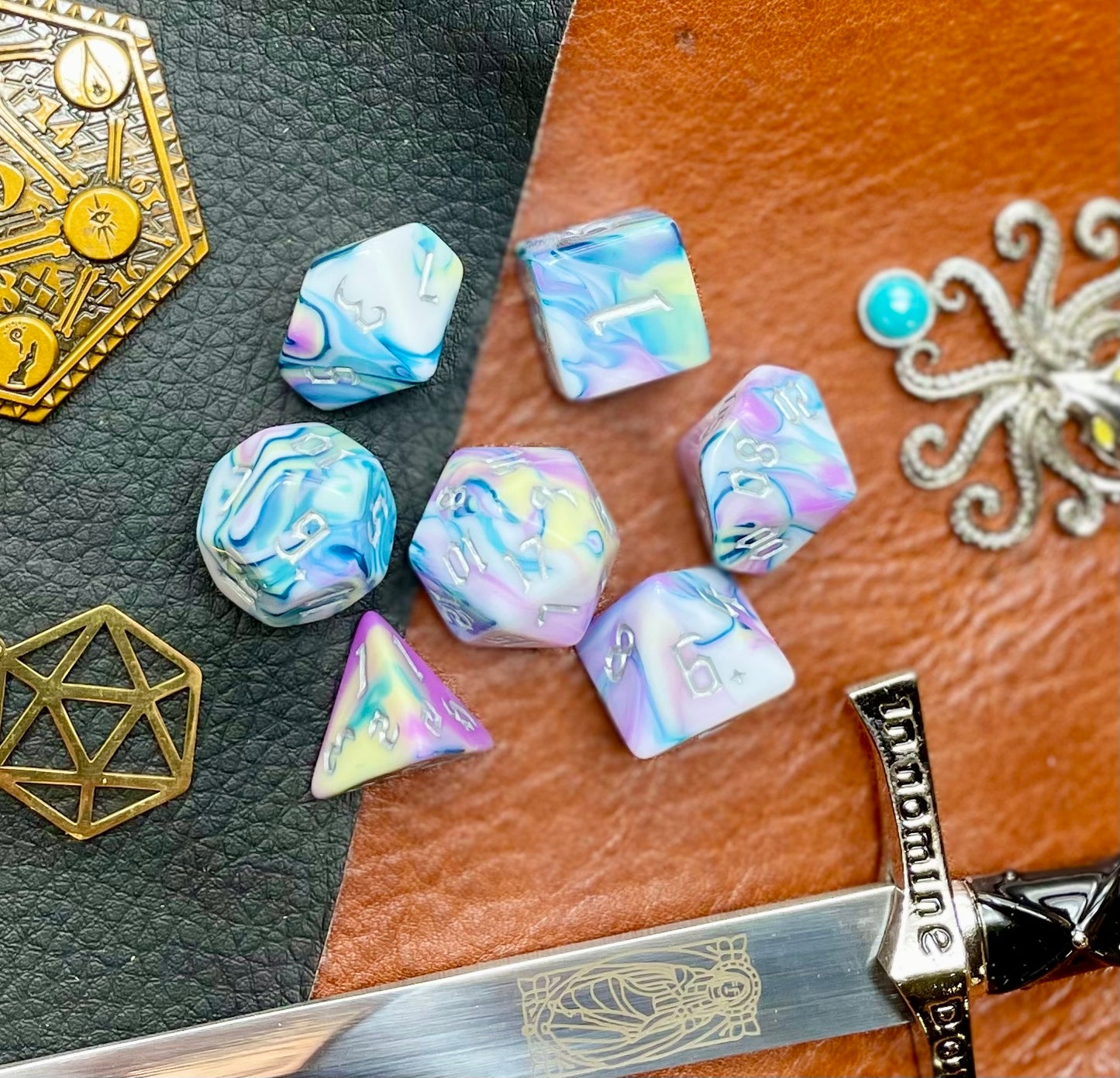 Forbidden Temple Polyhedral Dice Set Roll with style with these pink, yellow, turquoise and white marbled resin polyhedral dice set. They are standard 16mm polyhedral dice sets perfect for Tabletop games and RPG's such as pathfinder or dungeons and dragons. This set includes one of each D20, D12, D10, D%, D8, D6, D4.