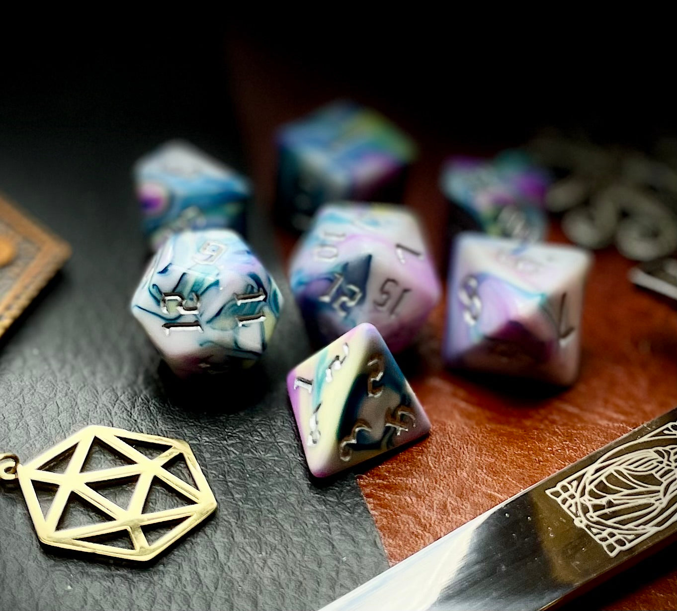 Forbidden Temple Polyhedral Dice Set Roll with style with these pink, yellow, turquoise and white marbled resin polyhedral dice set. They are standard 16mm polyhedral dice sets perfect for Tabletop games and RPG's such as pathfinder or dungeons and dragons. This set includes one of each D20, D12, D10, D%, D8, D6, D4.