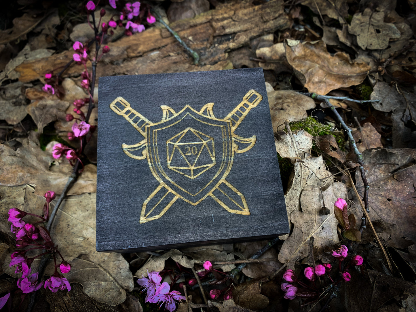 Choose from over 25 different designs and 8 colours to create your own unique dice box. Our boxes have been specially designed and manufactured for storing dice. We engrave, paint and finish each box individually on site before sending it on its way to you. Perfect from Dungeons & Dragons pathfinder and many other types of tabletop games.
