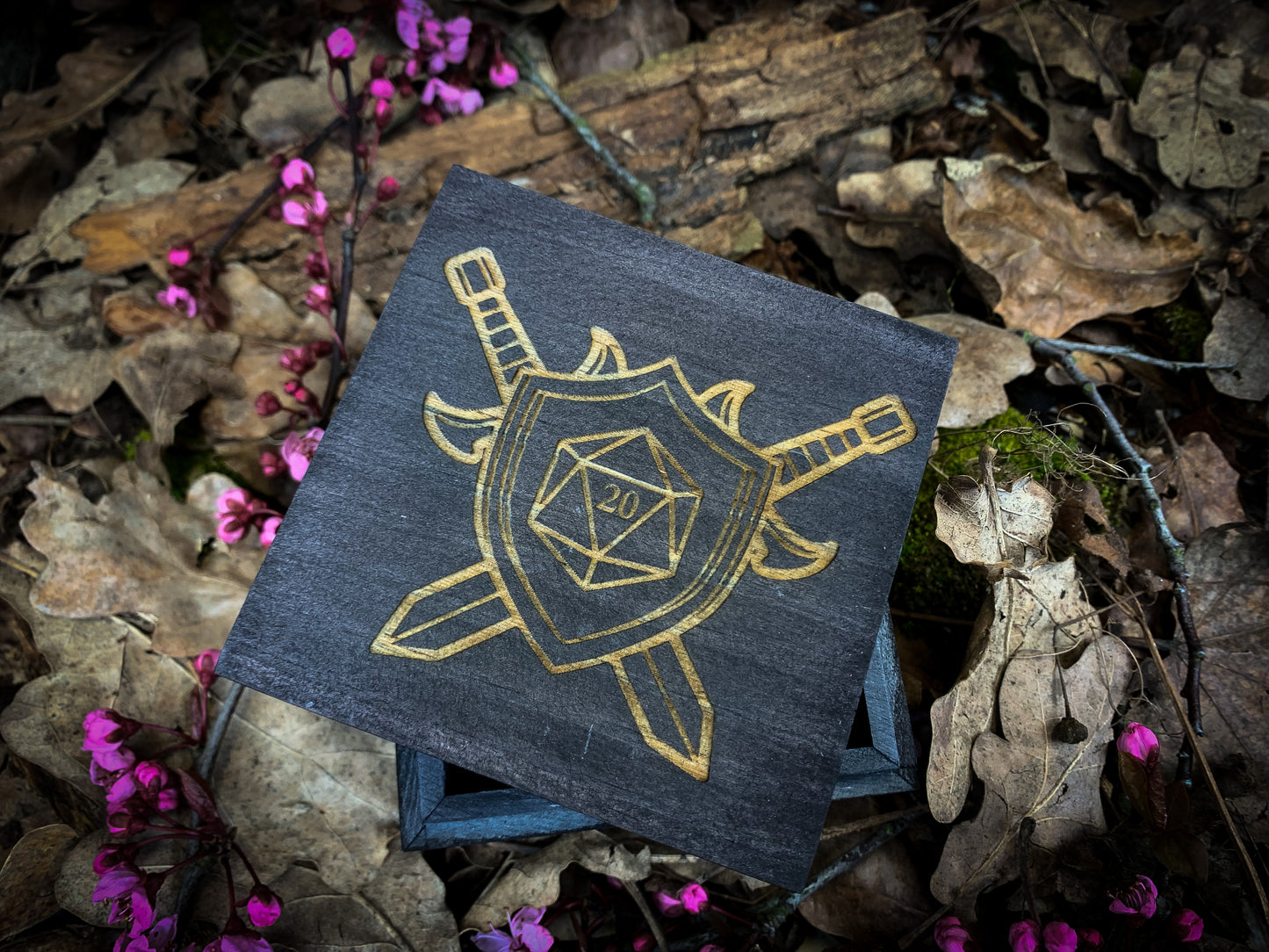 Choose from over 25 different designs and 8 colours to create your own unique dice box. Our boxes have been specially designed and manufactured for storing dice. We engrave, paint and finish each box individually on site before sending it on its way to you. Perfect from Dungeons & Dragons pathfinder and many other types of tabletop games.
