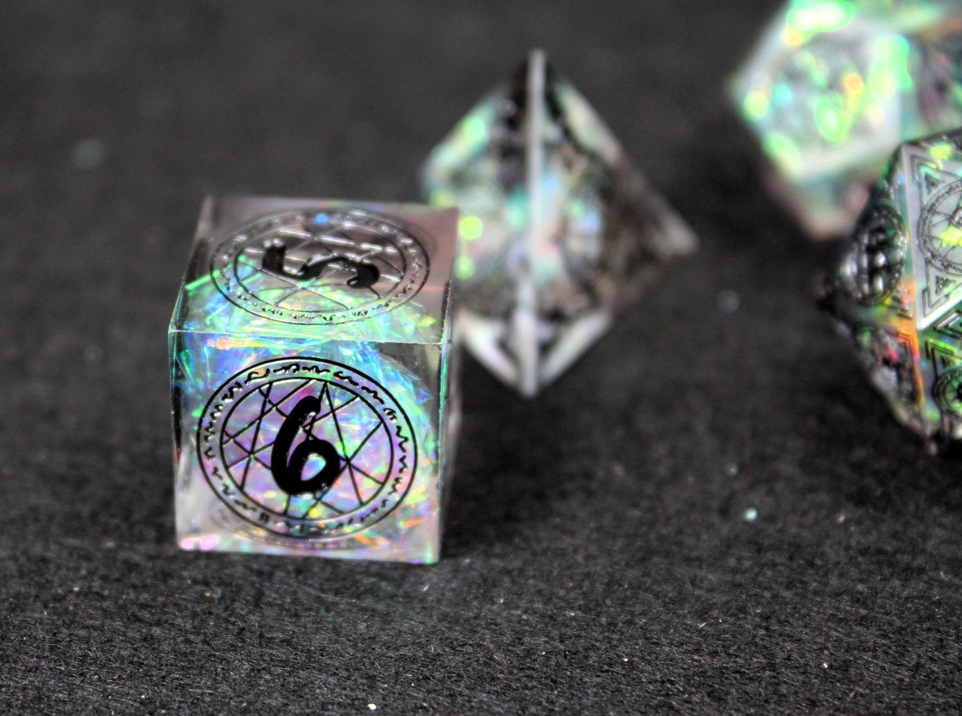 Sacred Runes Clear Glitter Sharp Edge Dice Set
Polished luxury sharp edge dice set
Roll in style with these polyhedral dice sets perfect for Tabletop games and RPG's such as pathfinder or dungeons and dragons.
This set includes one of each D20, D12, D10, D%, D8, D6, D4.
Available both with or without a PU leather dice storage box.