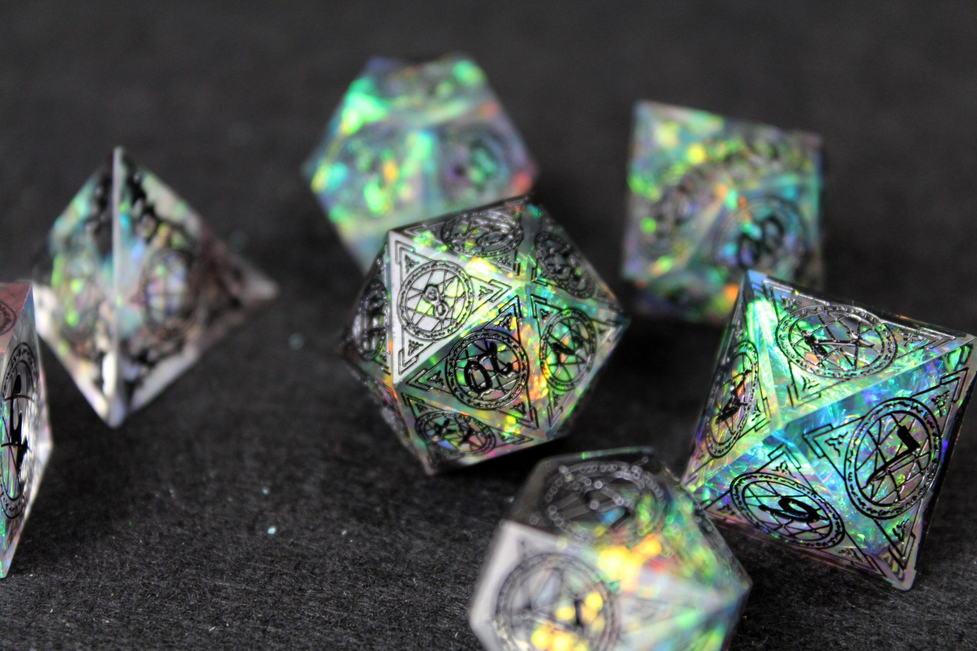 Sacred Runes Clear Glitter Sharp Edge Dice Set
Polished luxury sharp edge dice set
Roll in style with these polyhedral dice sets perfect for Tabletop games and RPG's such as pathfinder or dungeons and dragons.
This set includes one of each D20, D12, D10, D%, D8, D6, D4.
Available both with or without a PU leather dice storage box.