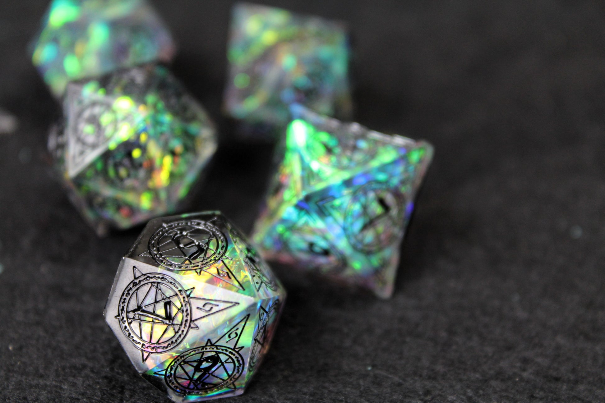 Sacred Runes Clear Glitter Sharp Edge Dice Set
Polished luxury sharp edge dice set
Roll in style with these polyhedral dice sets perfect for Tabletop games and RPG's such as pathfinder or dungeons and dragons.
This set includes one of each D20, D12, D10, D%, D8, D6, D4.
Available both with or without a PU leather dice storage box.