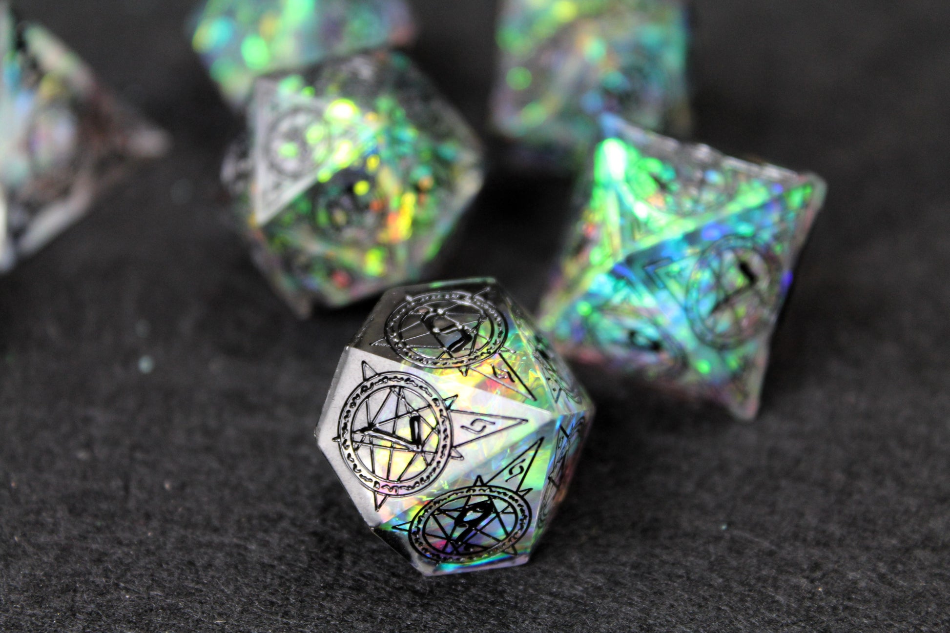 Sacred Runes Clear Glitter Sharp Edge Dice Set
Polished luxury sharp edge dice set
Roll in style with these polyhedral dice sets perfect for Tabletop games and RPG's such as pathfinder or dungeons and dragons.
This set includes one of each D20, D12, D10, D%, D8, D6, D4.
Available both with or without a PU leather dice storage box.