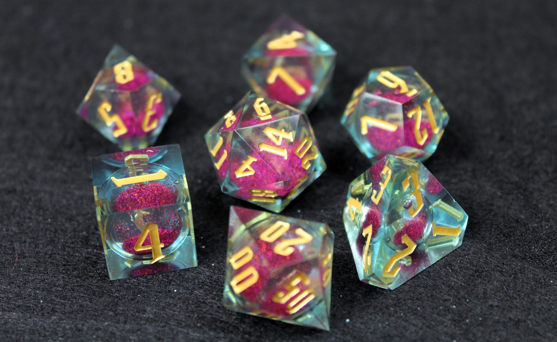 Purple And Clear Liquid Core Sharp Edge Dice Set
Polished luxury sharp edge dice set
Roll in style with these polyhedral dice sets perfect for Tabletop games and RPG's such as pathfinder or dungeons and dragons.
This set includes one of each D20, D12, D10, D%, D8, D6, D4.
Available both with or without a PU leather dice storage box.