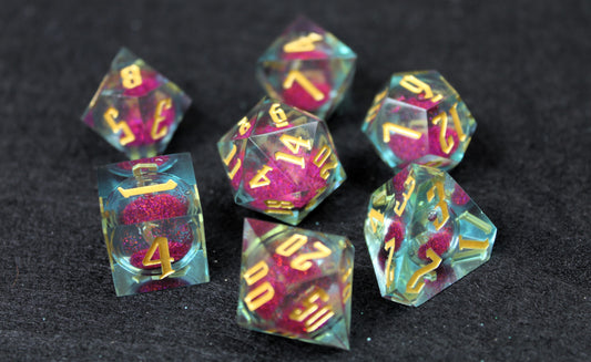 Purple And Clear Liquid Core Sharp Edge Dice Set
Polished luxury sharp edge dice set
Roll in style with these polyhedral dice sets perfect for Tabletop games and RPG's such as pathfinder or dungeons and dragons.
This set includes one of each D20, D12, D10, D%, D8, D6, D4.
Available both with or without a PU leather dice storage box.