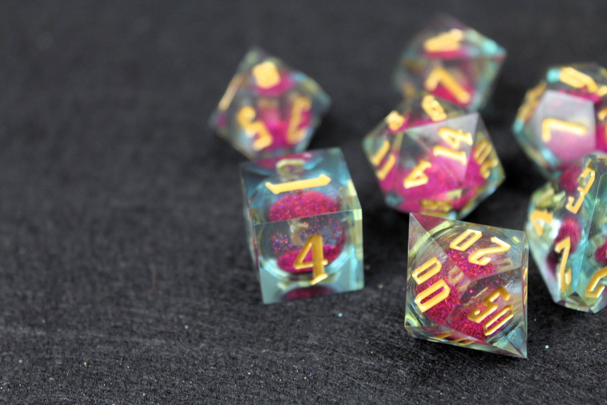 Purple And Clear Liquid Core Sharp Edge Dice Set
Polished luxury sharp edge dice set
Roll in style with these polyhedral dice sets perfect for Tabletop games and RPG's such as pathfinder or dungeons and dragons.
This set includes one of each D20, D12, D10, D%, D8, D6, D4.
Available both with or without a PU leather dice storage box.