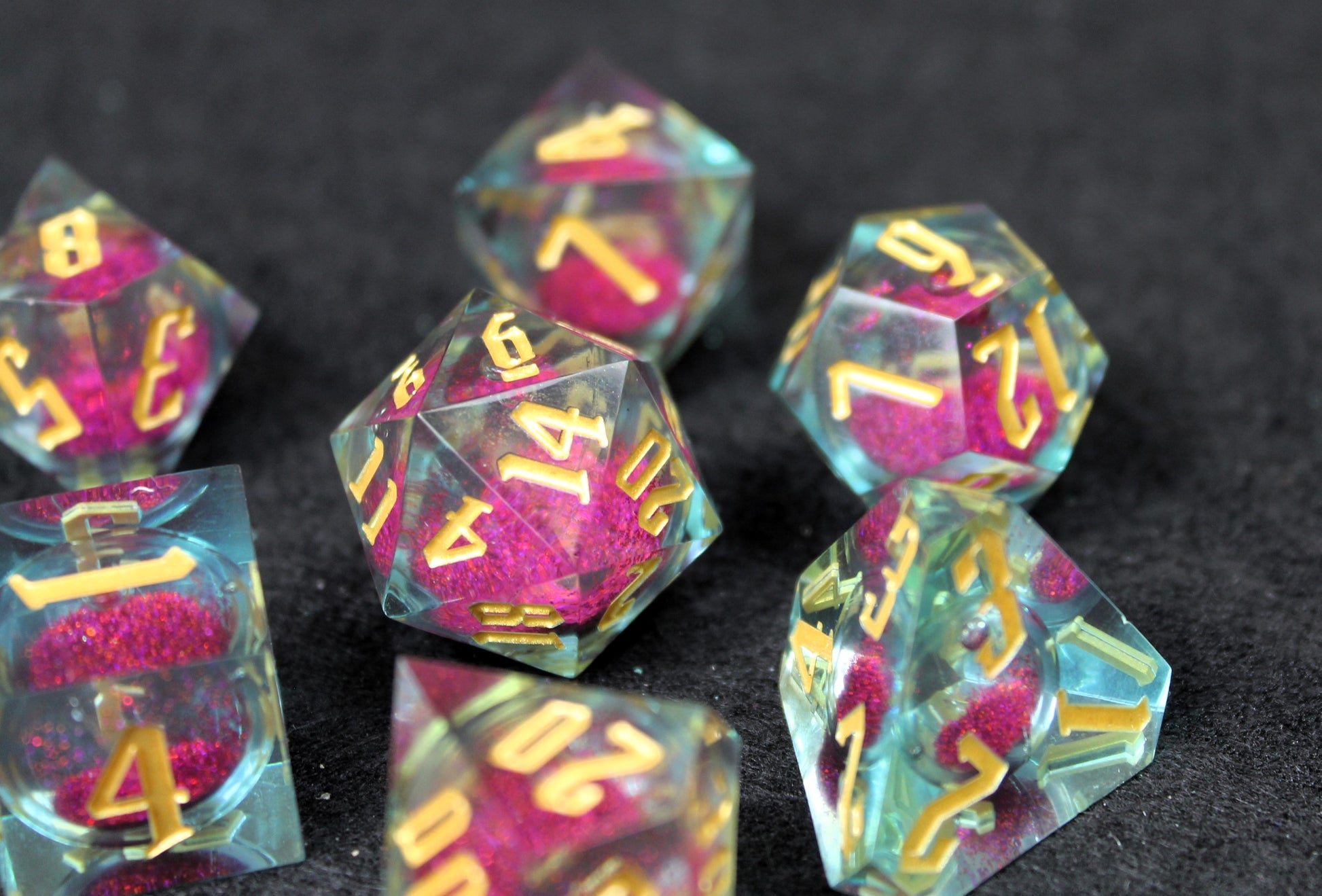 Purple And Clear Liquid Core Sharp Edge Dice Set
Polished luxury sharp edge dice set
Roll in style with these polyhedral dice sets perfect for Tabletop games and RPG's such as pathfinder or dungeons and dragons.
This set includes one of each D20, D12, D10, D%, D8, D6, D4.
Available both with or without a PU leather dice storage box.