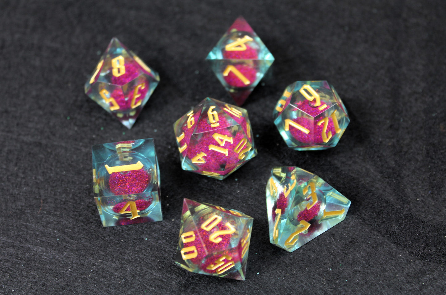 Purple And Clear Liquid Core Sharp Edge Dice Set
Polished luxury sharp edge dice set
Roll in style with these polyhedral dice sets perfect for Tabletop games and RPG's such as pathfinder or dungeons and dragons.
This set includes one of each D20, D12, D10, D%, D8, D6, D4.
Available both with or without a PU leather dice storage box.