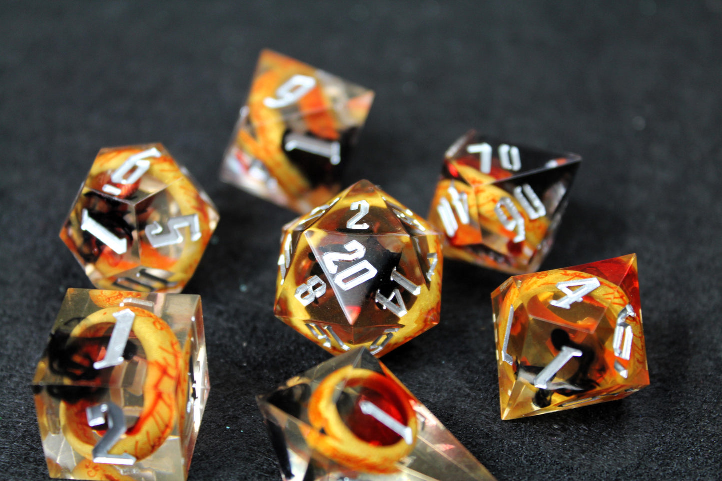 One Ring Sharp Edge Dice Set
Polished luxury sharp edge dice set
Roll in style with these polyhedral dice sets perfect for Tabletop games and RPG's such as pathfinder, Lord Of The Rings or dungeons and dragons.
This set includes one of each D20, D12, D10, D%, D8, D6, D4.
Available both with or without a PU leather dice storage box.