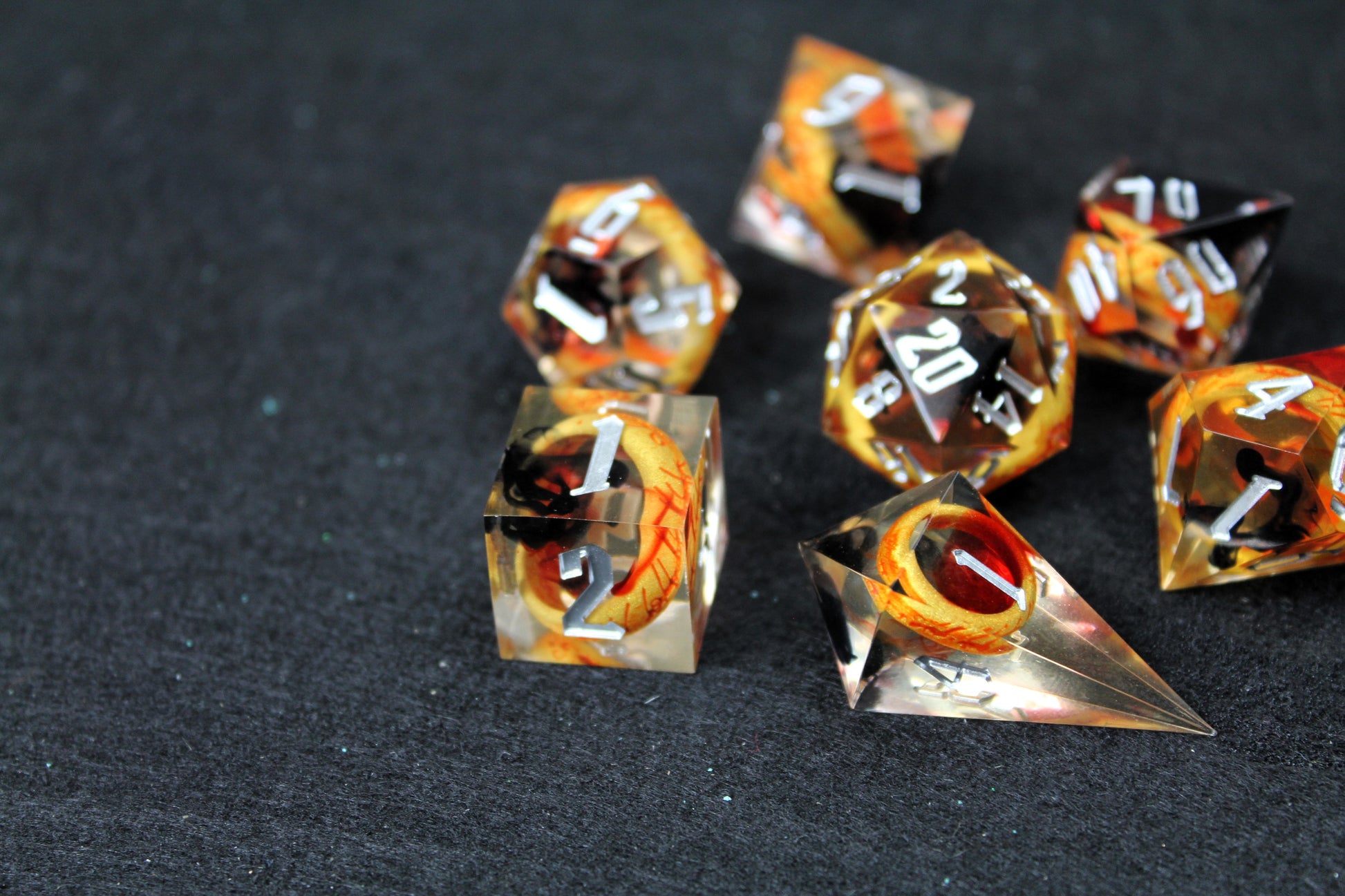 One Ring Sharp Edge Dice Set
Polished luxury sharp edge dice set
Roll in style with these polyhedral dice sets perfect for Tabletop games and RPG's such as pathfinder, Lord Of The Rings or dungeons and dragons.
This set includes one of each D20, D12, D10, D%, D8, D6, D4.
Available both with or without a PU leather dice storage box.