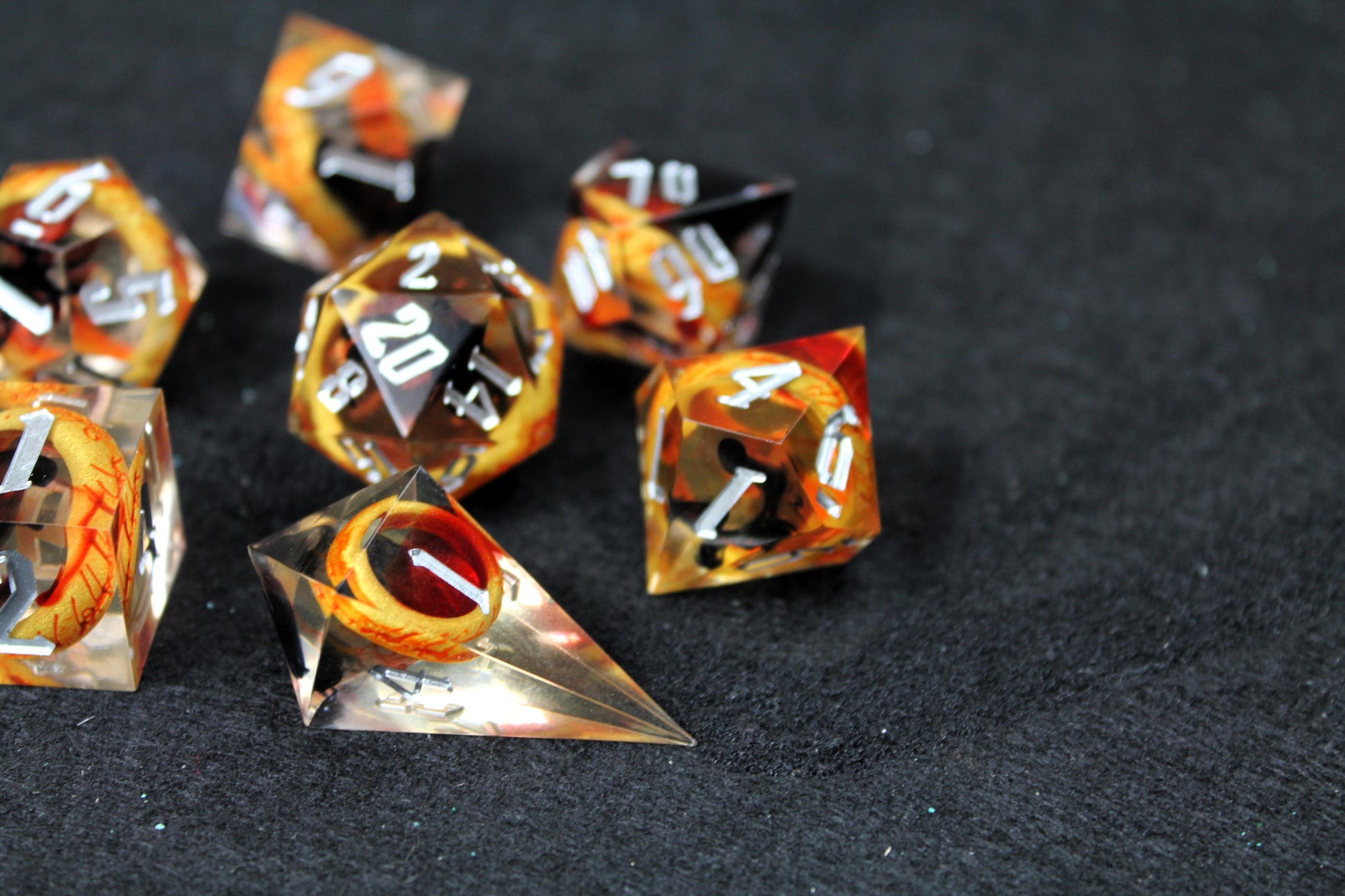 One Ring Sharp Edge Dice Set
Polished luxury sharp edge dice set
Roll in style with these polyhedral dice sets perfect for Tabletop games and RPG's such as pathfinder, Lord Of The Rings or dungeons and dragons.
This set includes one of each D20, D12, D10, D%, D8, D6, D4.
Available both with or without a PU leather dice storage box.