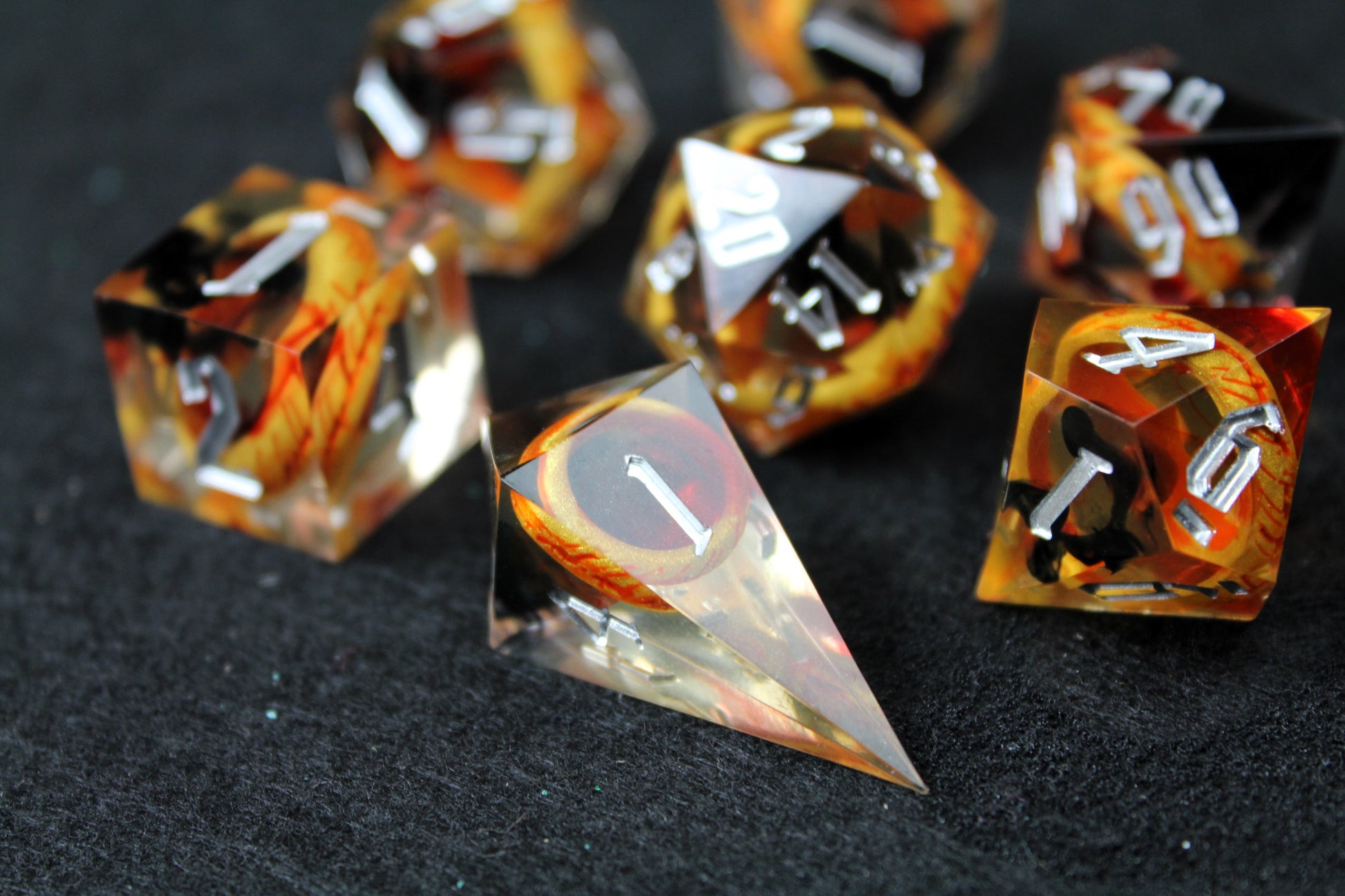 One Ring Sharp Edge Dice Set
Polished luxury sharp edge dice set
Roll in style with these polyhedral dice sets perfect for Tabletop games and RPG's such as pathfinder, Lord Of The Rings or dungeons and dragons.
This set includes one of each D20, D12, D10, D%, D8, D6, D4.
Available both with or without a PU leather dice storage box.