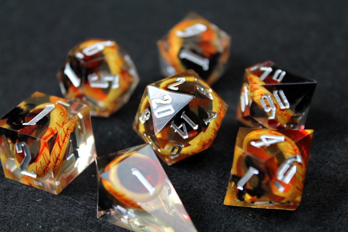 One Ring Sharp Edge Dice Set
Polished luxury sharp edge dice set
Roll in style with these polyhedral dice sets perfect for Tabletop games and RPG's such as pathfinder, Lord Of The Rings or dungeons and dragons.
This set includes one of each D20, D12, D10, D%, D8, D6, D4.
Available both with or without a PU leather dice storage box.