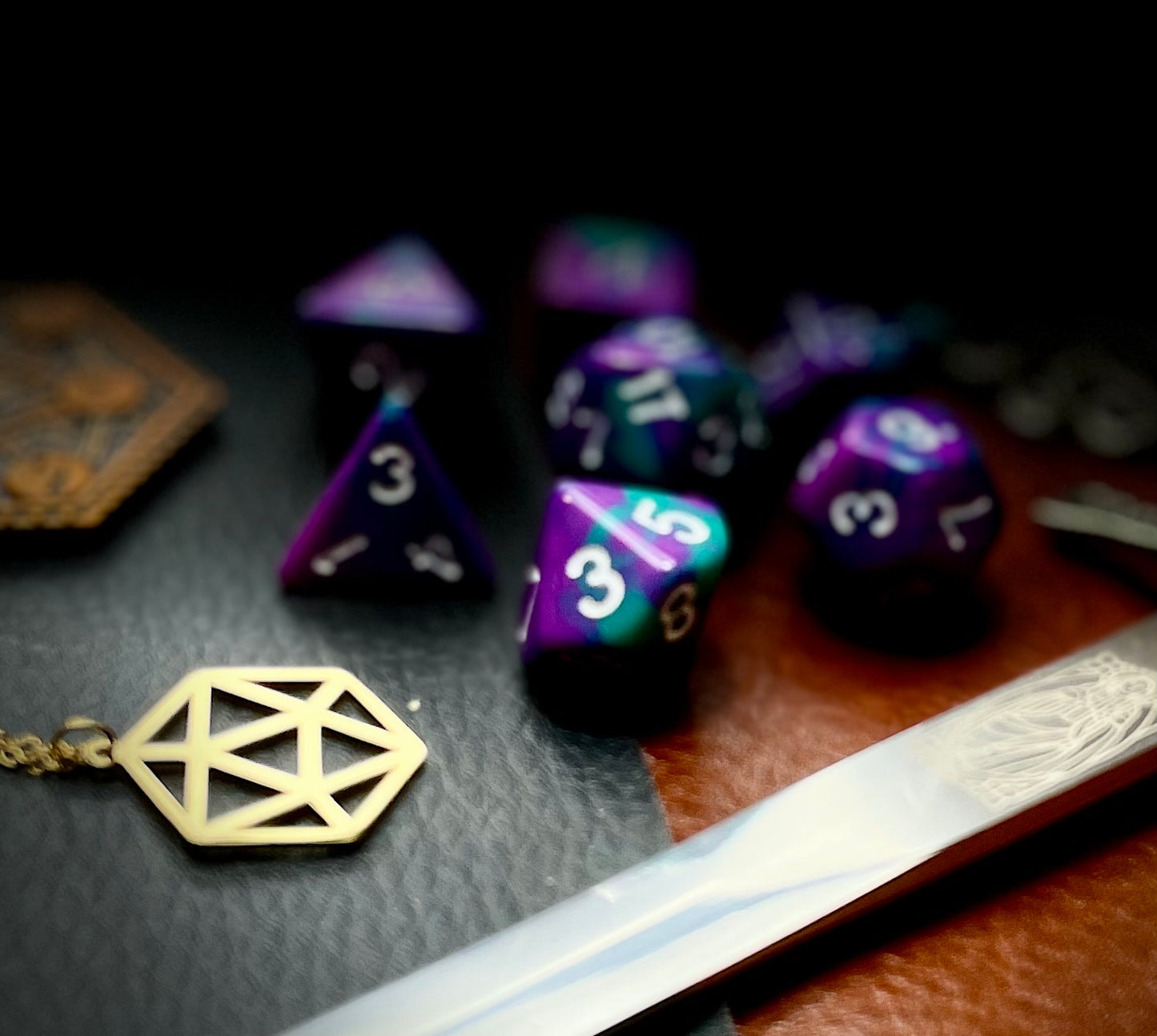 Elemental Joker resin polyhedral dice set. Descend into madness with these fantastic resin dice. Combining turquoise, teal and blue swirls; each dice has its own unique pattern. They are standard 16mm polyhedral dice sets perfect for Tabletop games and RPG's such as pathfinder or dungeons and dragons. This set includes one of each D20, D12, D10, D%, D8, D6, D4.