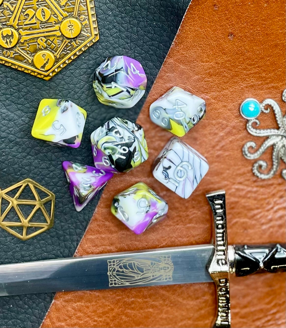 Gates of Oblivion Marble Polyhedral Dice Set March of the Gates of Oblivion with these white, black, grey, purple and yellow marbled resin polyhedral dice set. They are standard 16mm polyhedral dice sets perfect for Tabletop games and RPG's such as pathfinder or dungeons and dragons. This set includes one of each D20, D12, D10, D%, D8, D6, D4.
