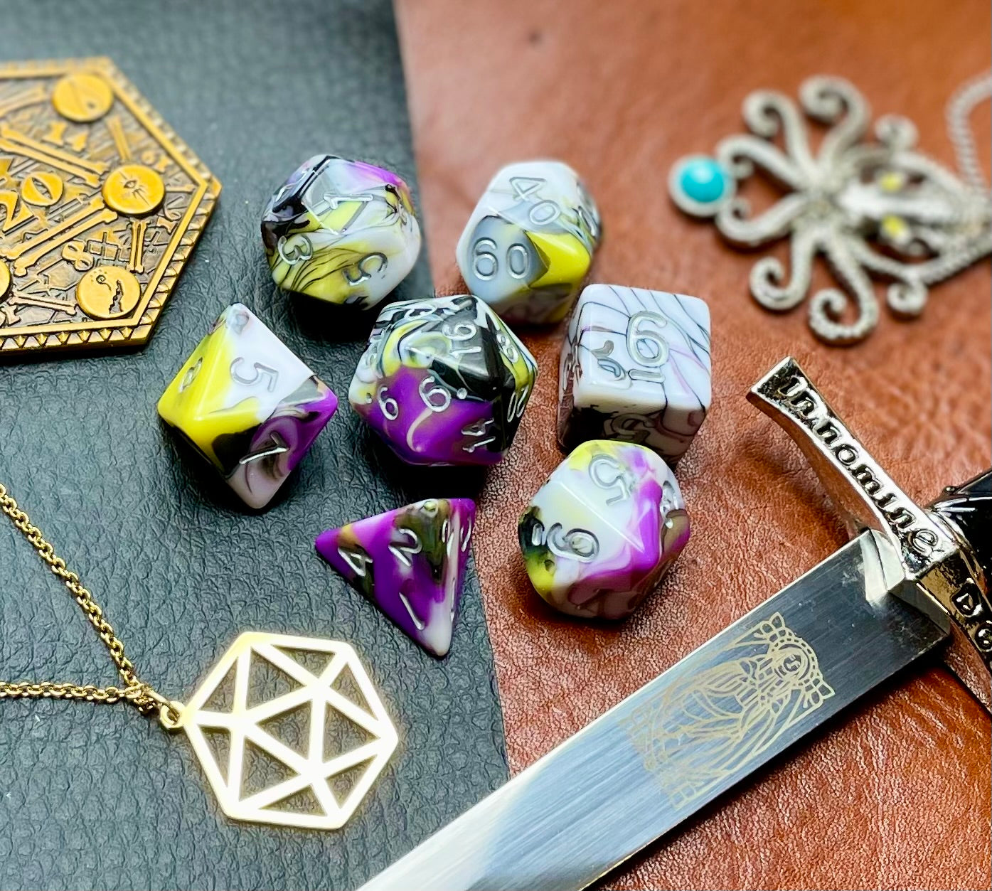 Gates of Oblivion Marble Polyhedral Dice Set March of the Gates of Oblivion with these white, black, grey, purple and yellow marbled resin polyhedral dice set. They are standard 16mm polyhedral dice sets perfect for Tabletop games and RPG's such as pathfinder or dungeons and dragons. This set includes one of each D20, D12, D10, D%, D8, D6, D4.