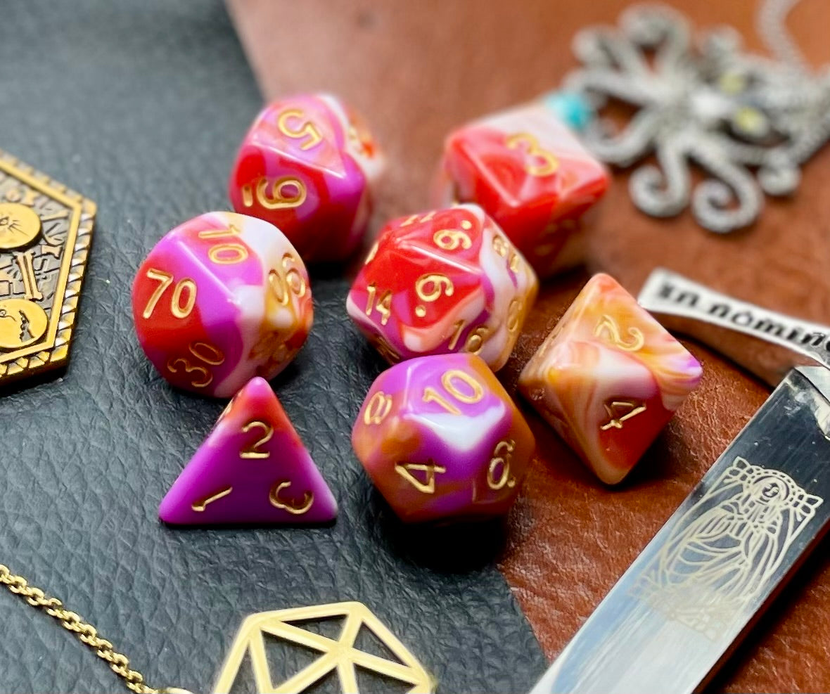 Pavlova Polyhedral Dice Set Roll sweetly with these white, pink, orange and red marbled resin polyhedral dice set. They are standard 16mm polyhedral dice sets perfect for Tabletop games and RPG's such as pathfinder or dungeons and dragons. This set includes one of each D20, D12, D10, D%, D8, D6, D4.