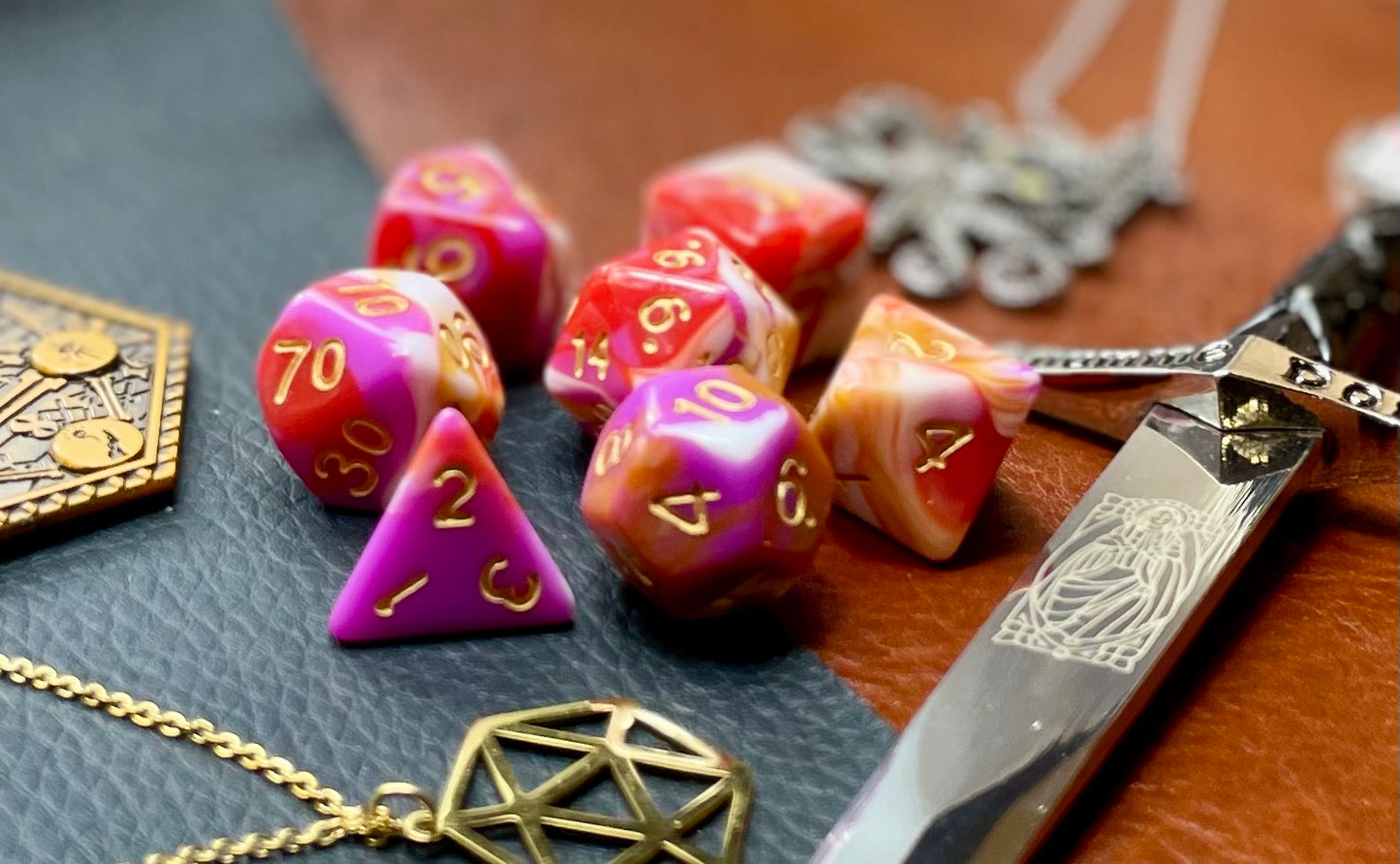 Pavlova Polyhedral Dice Set Roll sweetly with these white, pink, orange and red marbled resin polyhedral dice set. They are standard 16mm polyhedral dice sets perfect for Tabletop games and RPG's such as pathfinder or dungeons and dragons. This set includes one of each D20, D12, D10, D%, D8, D6, D4.