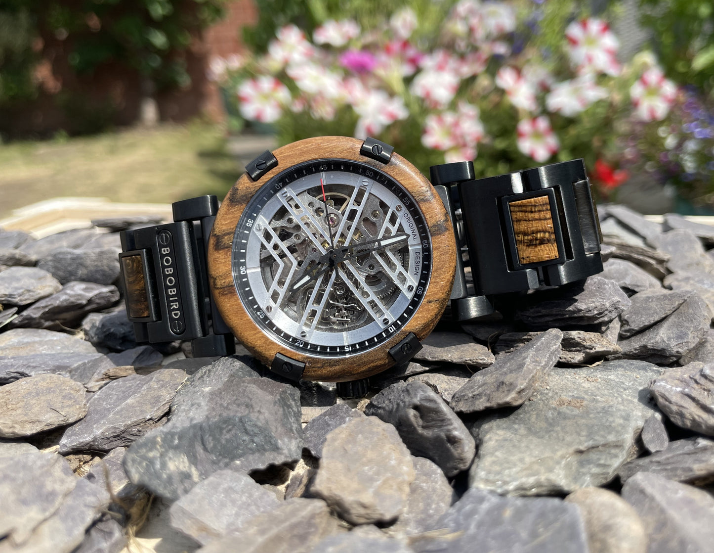 Metal Cog Face Wood & Metal Interlocking Strap Self Winding Luxury Wooden Eco Watch
Made from solid wood and black anodised stainless steel; these watches are both comfortable to wear and a unique timepiece.