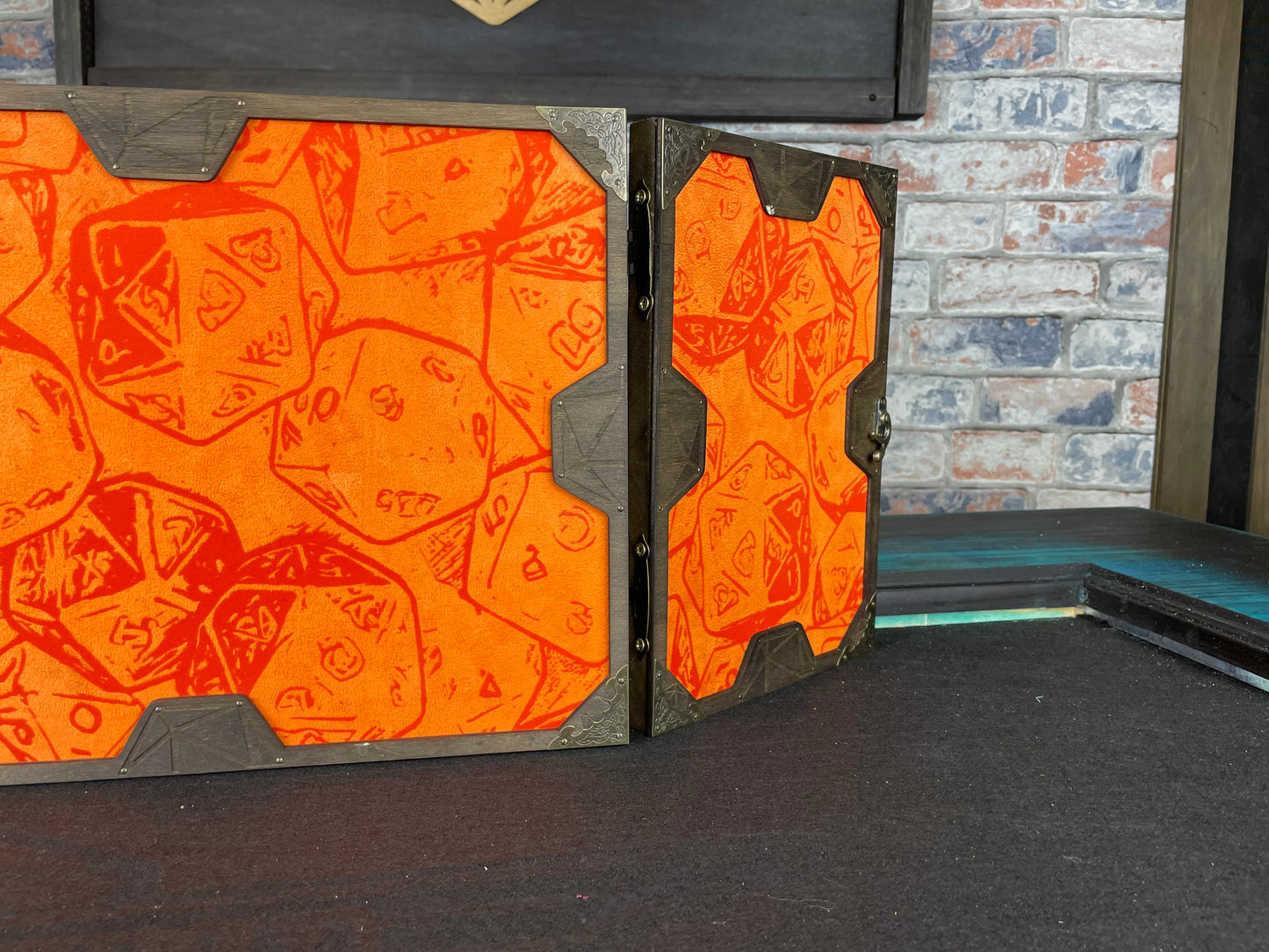 Roll The Dice Dungeon Master Screen is a must-have for any tabletop gaming enthusiast. Crafted from high-quality wood and engraved with intricate designs, this screen is both sturdy and visually stunning. Ideal for tabletop gaming, Dungeons and Dragons, Pathfinder and many other TTRPG's