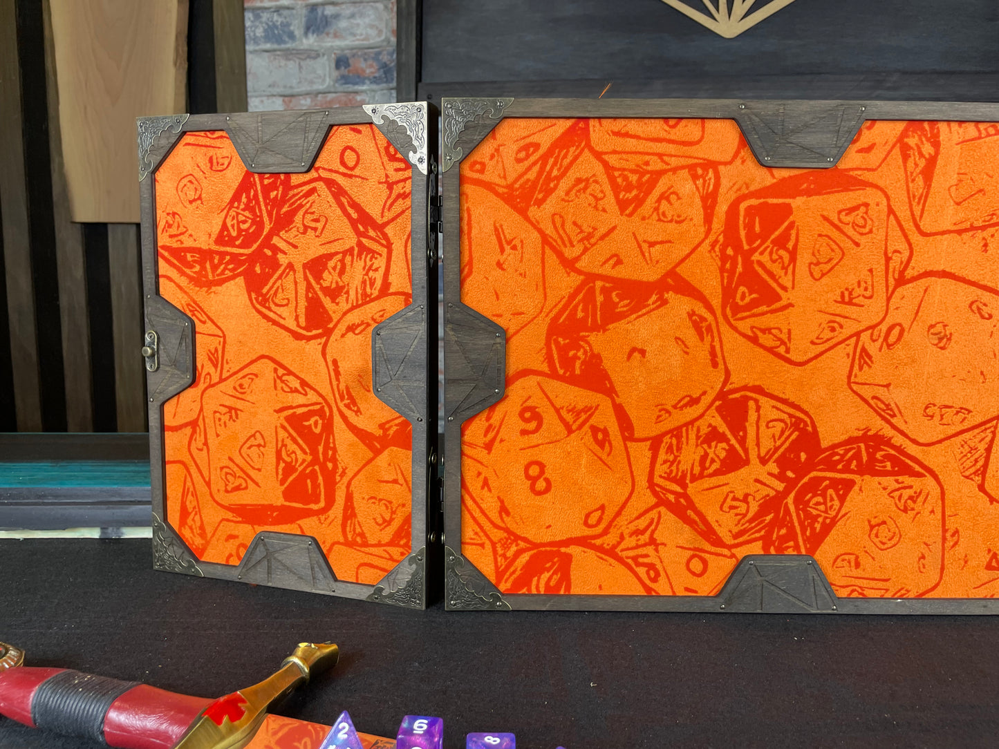 Roll The Dice Dungeon Master Screen is a must-have for any tabletop gaming enthusiast. Crafted from high-quality wood and engraved with intricate designs, this screen is both sturdy and visually stunning. Ideal for tabletop gaming, Dungeons and Dragons, Pathfinder and many other TTRPG's