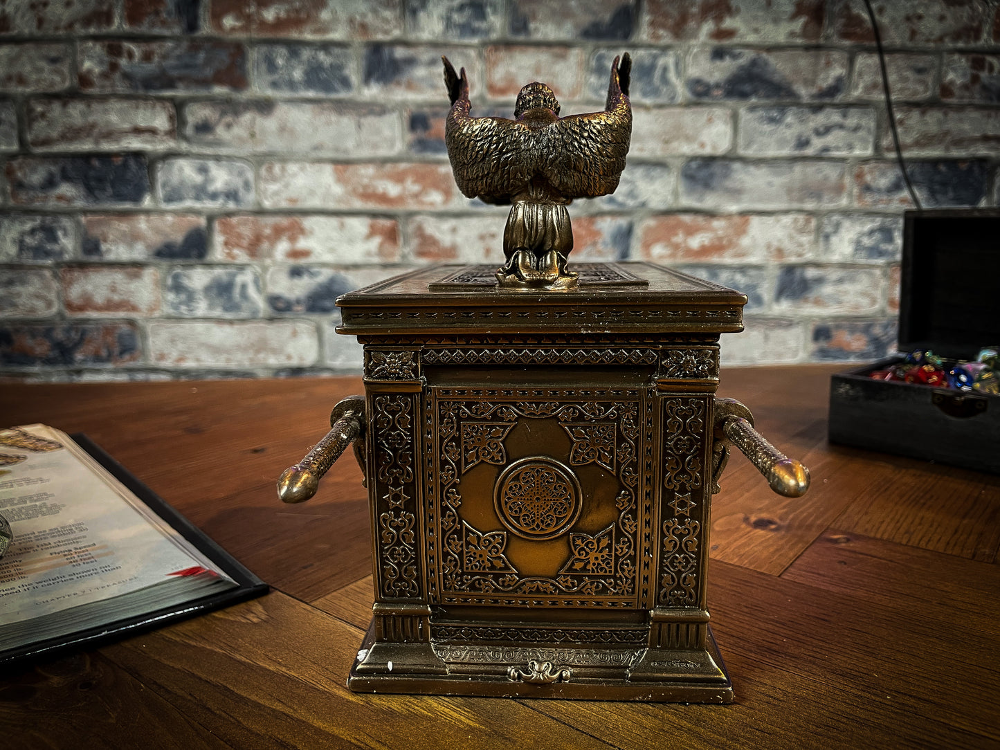 Cast in the finest resin before being given a bronzed finish, this ethereal box is super detailed and makes a perfect display piece. The Ark of the Covenant is a gold-covered chest that holds the two stone tablets of the Ten Commandments and is replicated here. Free UK delivery by Fandomonium