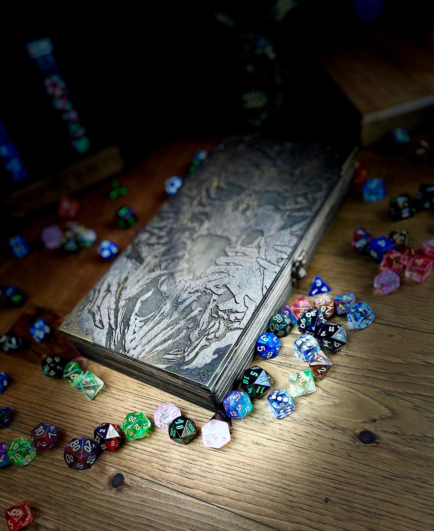 Necromancers Vault Dice Box, Accessory Storage and Roll Tray. Hand finished dice box for storing dice, cards, counters and accessories with handy pen storage and in built roll tray. Choose from 8 vibrant colour finished to make your box unique to you. Complete with our unique necromancy inspired design, metal corner protectors and clasp