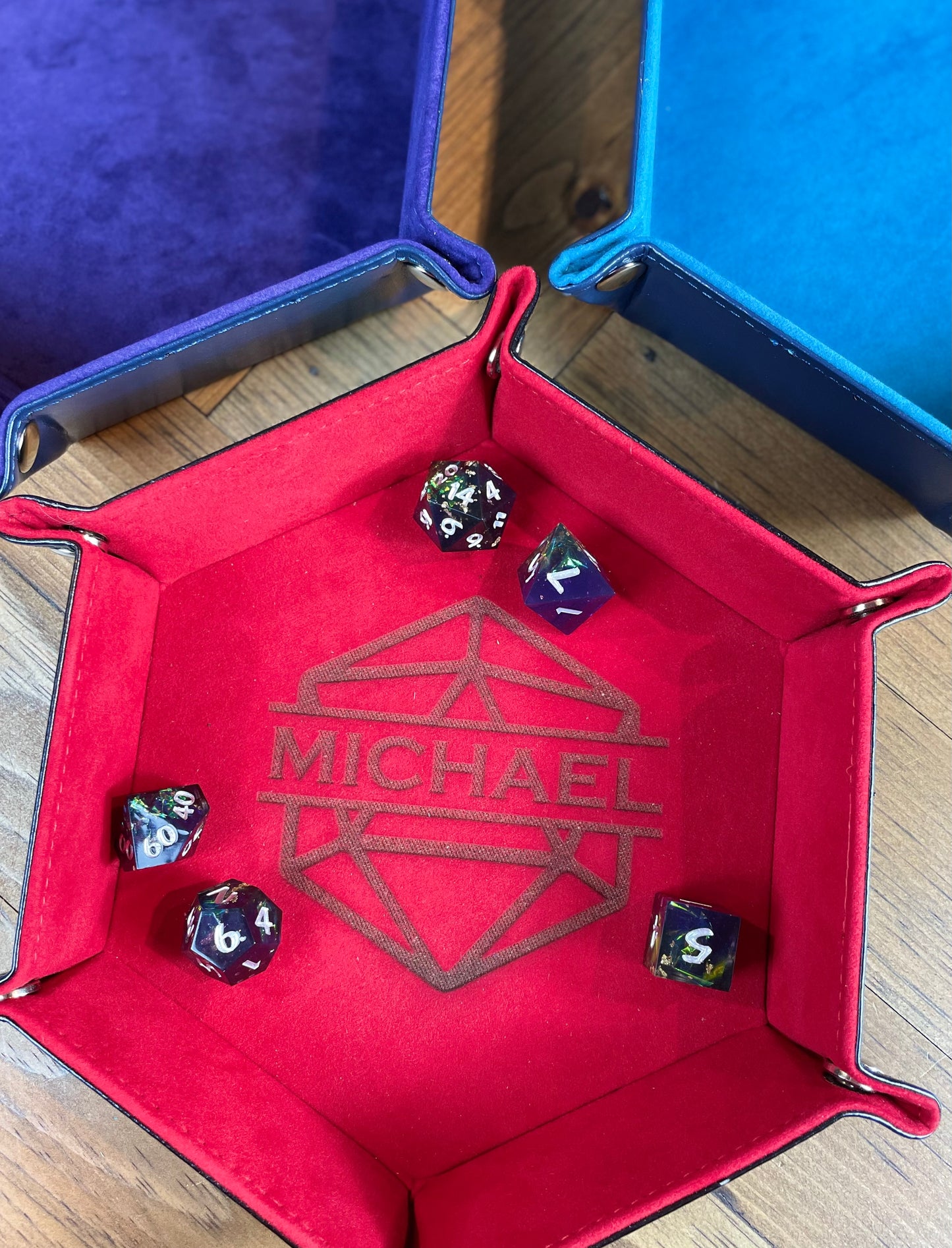 Personalised Hexagon Dice Tray Stud fixing lay flat dice rolling tray. With a PU leather outside and a velour inside in a choice of 3 vibrant colours; these trays are easy to transport and store while looking great. 