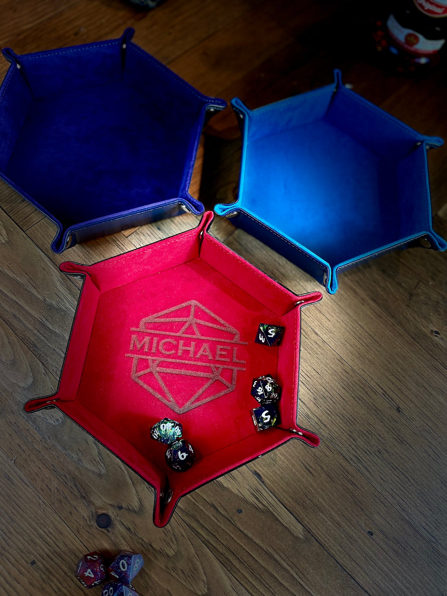 Personalised Hexagon Dice Tray Stud fixing lay flat dice rolling tray. With a PU leather outside and a velour inside in a choice of 3 vibrant colours; these trays are easy to transport and store while looking great. 