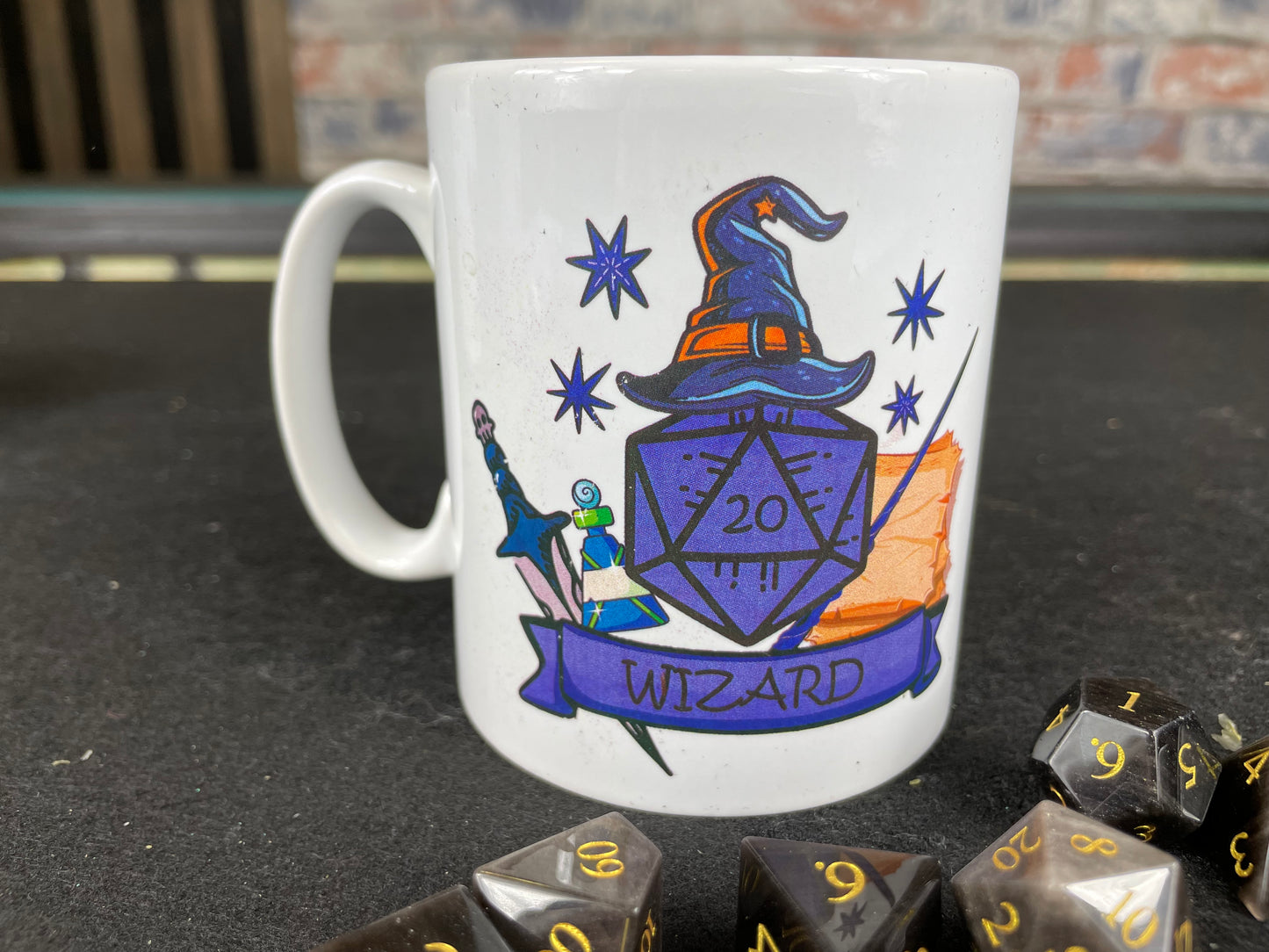 Wizard Class DND Mug
Delving into the secrets of hidden tomes can be thirsty work learned Wizard! Quench your thirst using our 10oz ceramic mug with our custom designed Wizard class D20.
