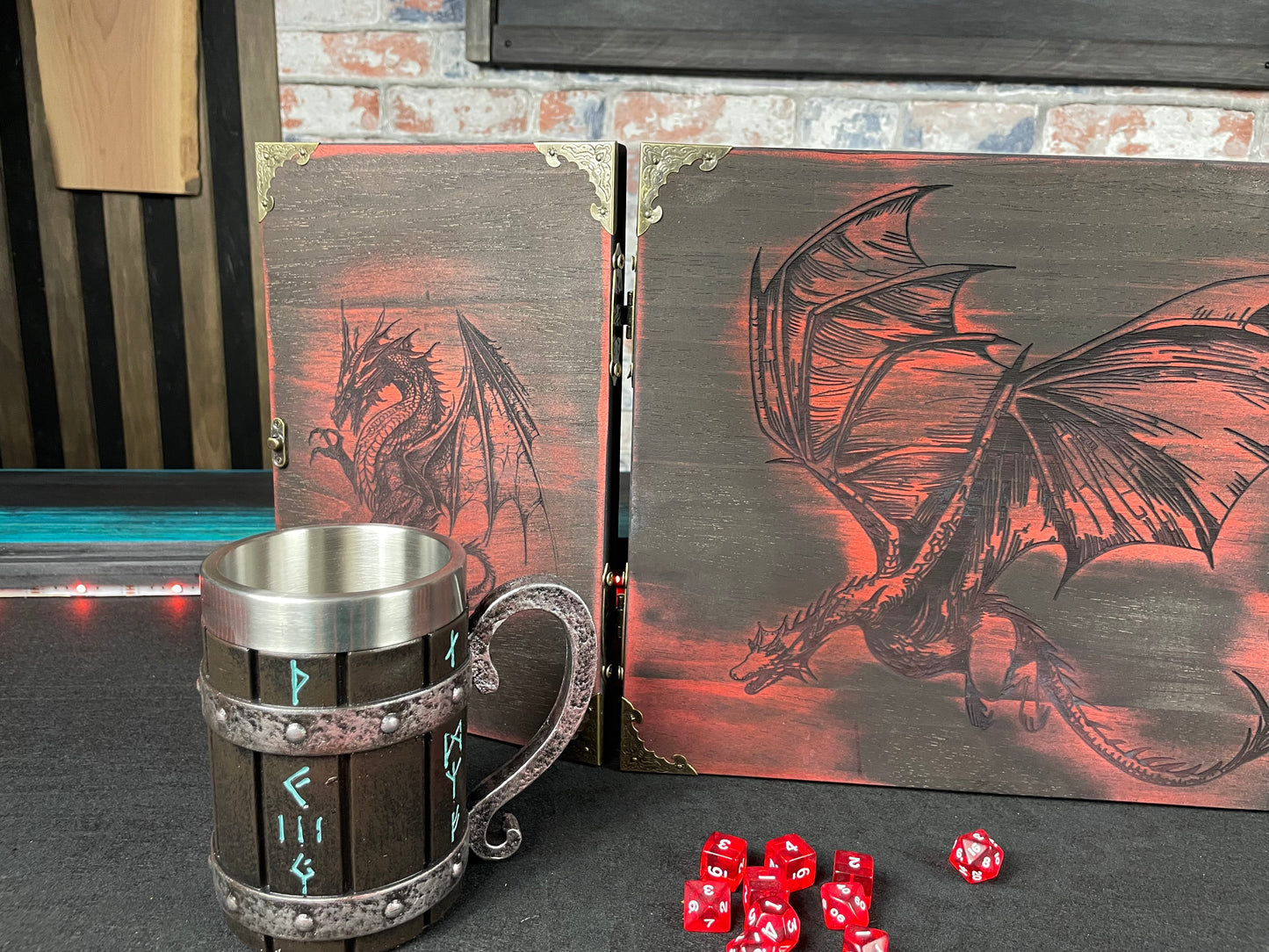 Fire Dragon DM Screen Our brand new addition to our range of screens Featuring our 3 fire dragons, the screen's 3 sections fold on hinges and has an antique effect catch for easy storage. Each screen is painted black before accenting the design in one of 4 vibrant colours; red, green, blue or purple. We embellish the DM screen with antiqued corner protectors to save you from bumps and scrapes. 
