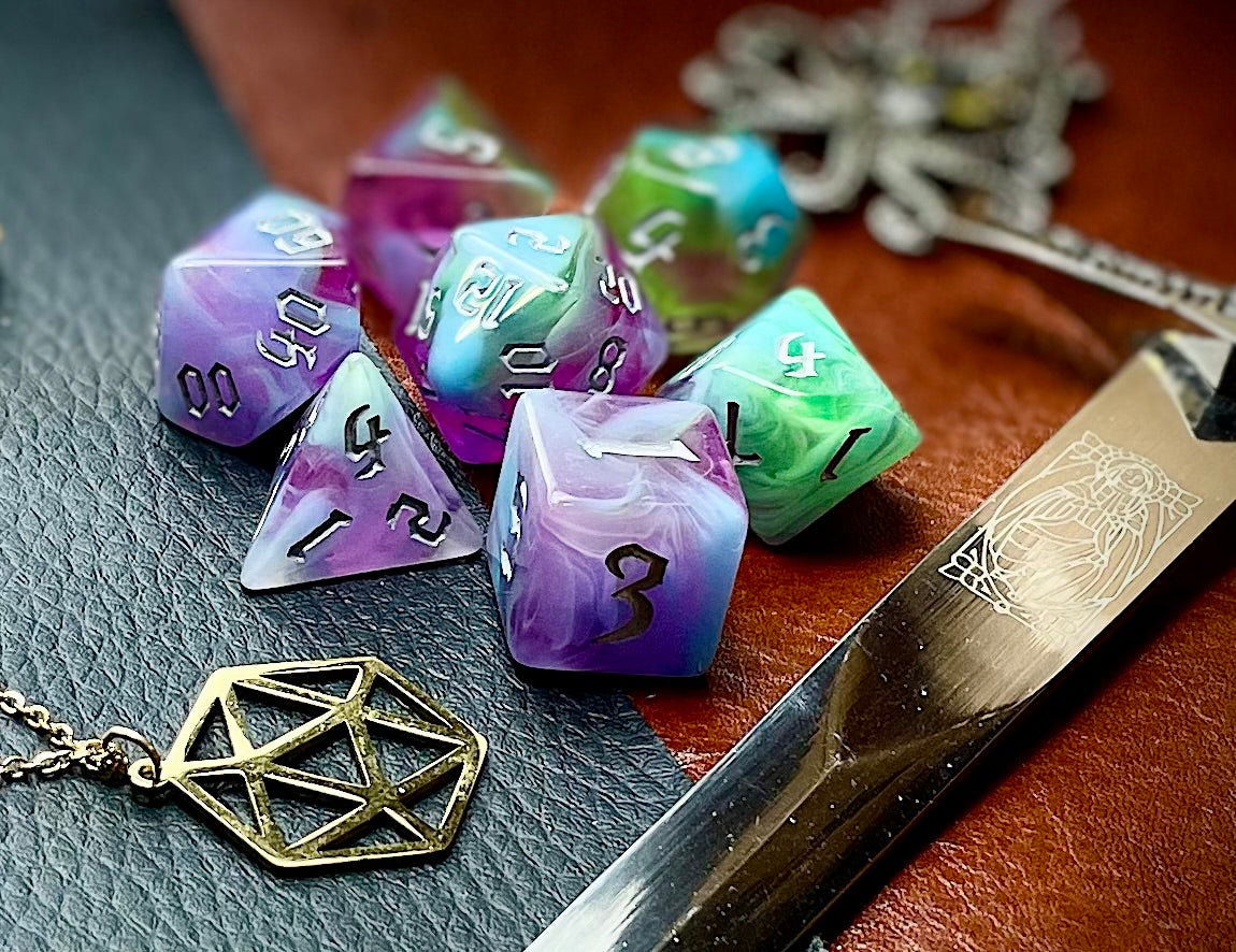 Sea Elves Polyhedral Dice Set Take to the seas with these purple and green marbled resin polyhedral dice set. They are standard 16mm polyhedral dice sets perfect for Tabletop games and RPG's such as pathfinder or dungeons and dragons. This set includes one of each D20, D12, D10, D%, D8, D6, D4.