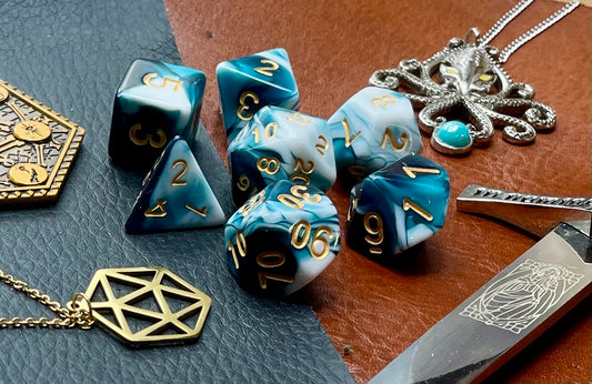 Teal and White Marble Polyhedral Dice Set  Roll with style with these teal and white marbled resin polyhedral dice set.  They are standard 16mm polyhedral dice sets perfect for Tabletop games and RPG's such as pathfinder or dungeons and dragons.  This set includes one of each D20, D12, D10, D%, D8, D6, D4.