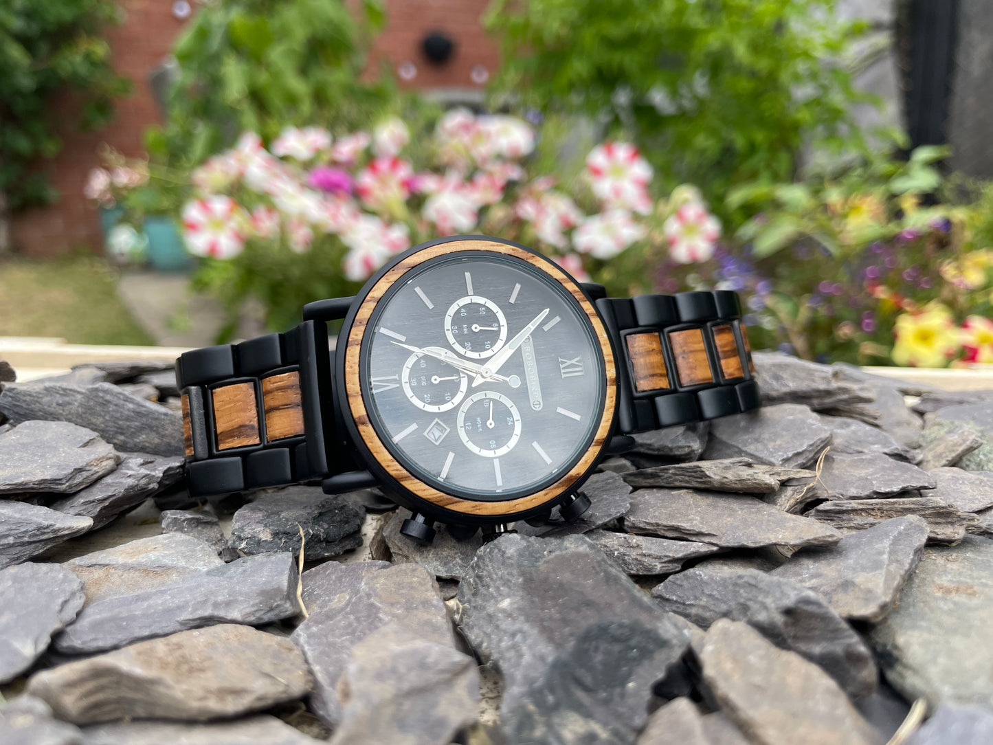 Walnut & Zebrano Interlocking Strap Self Winding Wooden Eco Watch
Made from solid walnut and zebrano, these watches are both comfortable to wear and a unique timepiece. Featuring a black metal interlocking frame strap with inlayed wooden panels to create a unique look.