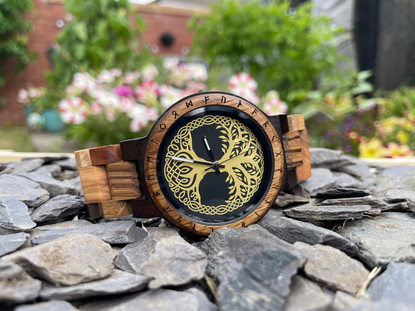 Yggdrasil Tree Of Life Design Wooden Eco Watch
Made from solid wood, these watches are both comfortable to wear and a unique timepiece.
Perfect for fans of Norse mythology; this stylish watch comes with a Yggdrasil or Norse Tree Of Life detail on the watch face. Free UK delivery by Fandomonium