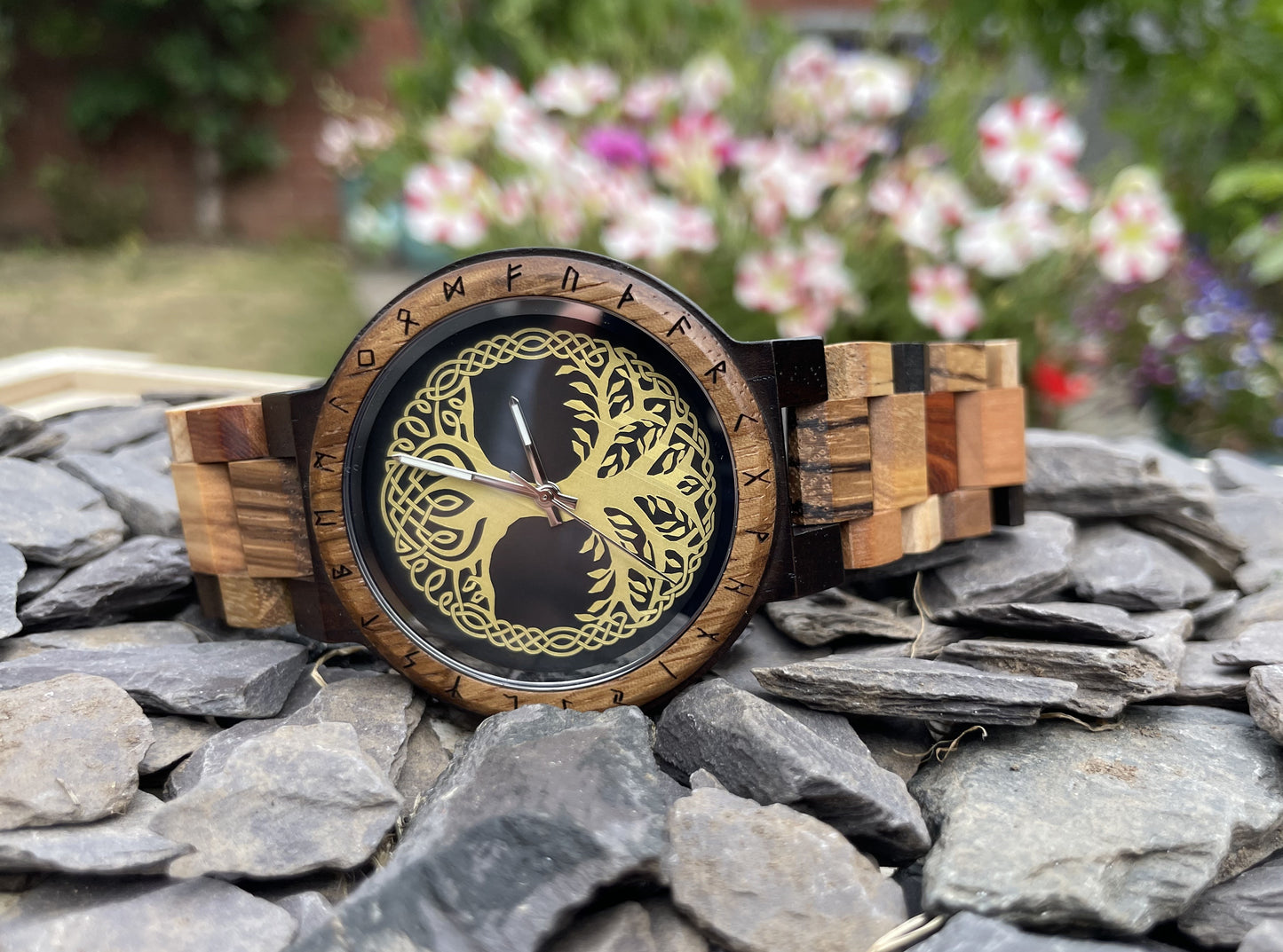 Yggdrasil Tree Of Life Design Wooden Eco Watch
Made from solid wood, these watches are both comfortable to wear and a unique timepiece.
Perfect for fans of Norse mythology; this stylish watch comes with a Yggdrasil or Norse Tree Of Life detail on the watch face. Free UK delivery by Fandomonium