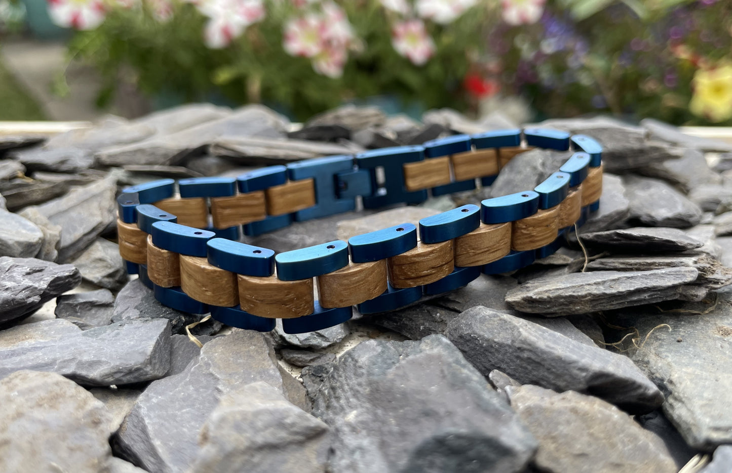 Zebrano & Metal Bracelet
Made from solid "Zebra Wood" Zebrano and blue anodised stainless steel; these bracelets are both comfortable to wear and a unique piece of jewellery.