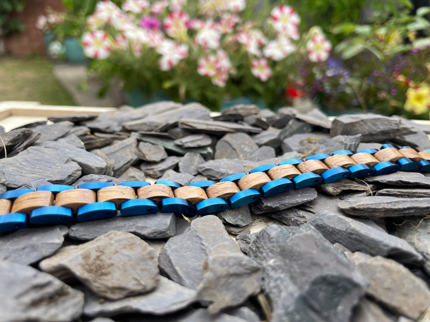Zebrano & Metal Bracelet
Made from solid "Zebra Wood" Zebrano and blue anodised stainless steel; these bracelets are both comfortable to wear and a unique piece of jewellery.
