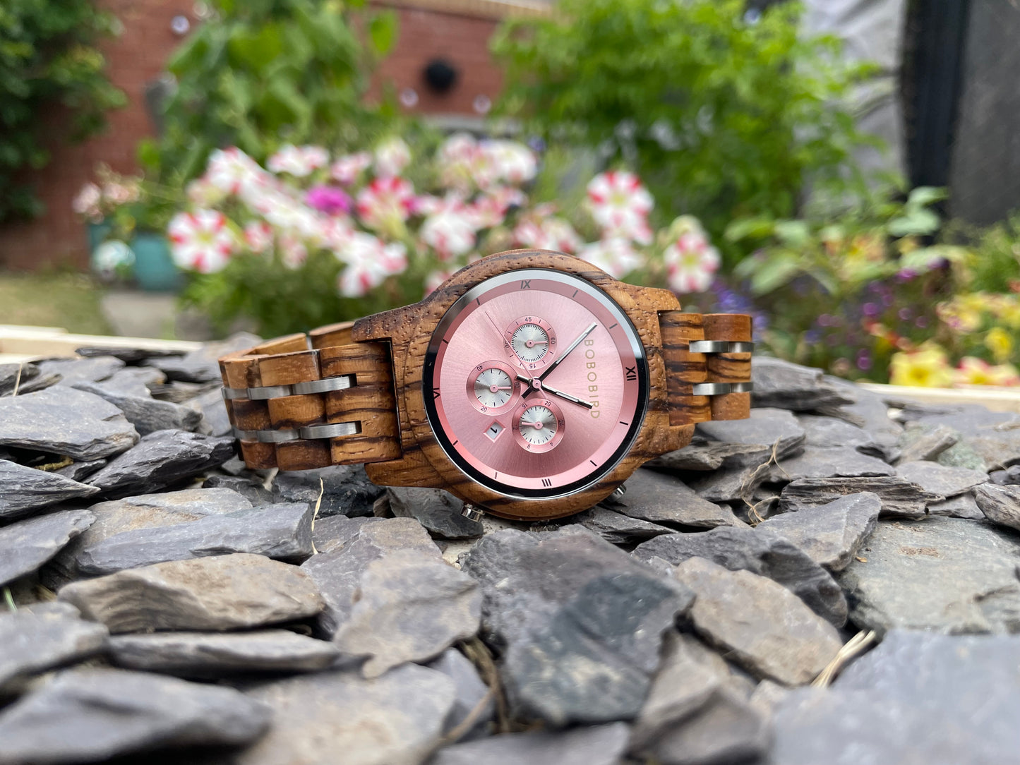 Zebrano & Metal Interlocking Strap Wooden Eco Ladies Watch
Made from solid zebrano, these watches are both comfortable to wear and a unique timepiece. Featuring a zebrano and metal interlocking frame strap along with a rose pink metallic face to create a unique look.