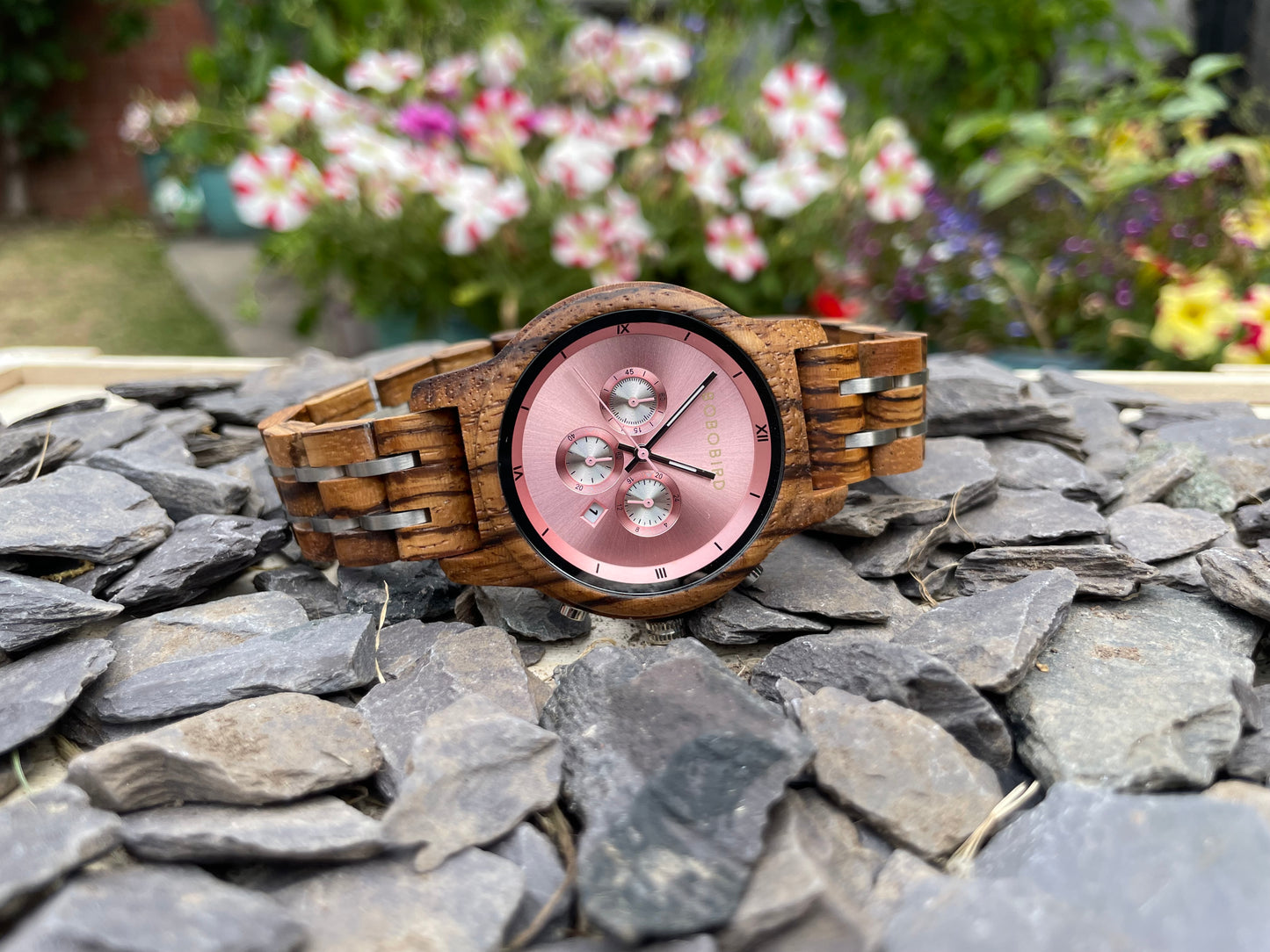 Zebrano & Metal Interlocking Strap Wooden Eco Ladies Watch
Made from solid zebrano, these watches are both comfortable to wear and a unique timepiece. Featuring a zebrano and metal interlocking frame strap along with a rose pink metallic face to create a unique look.