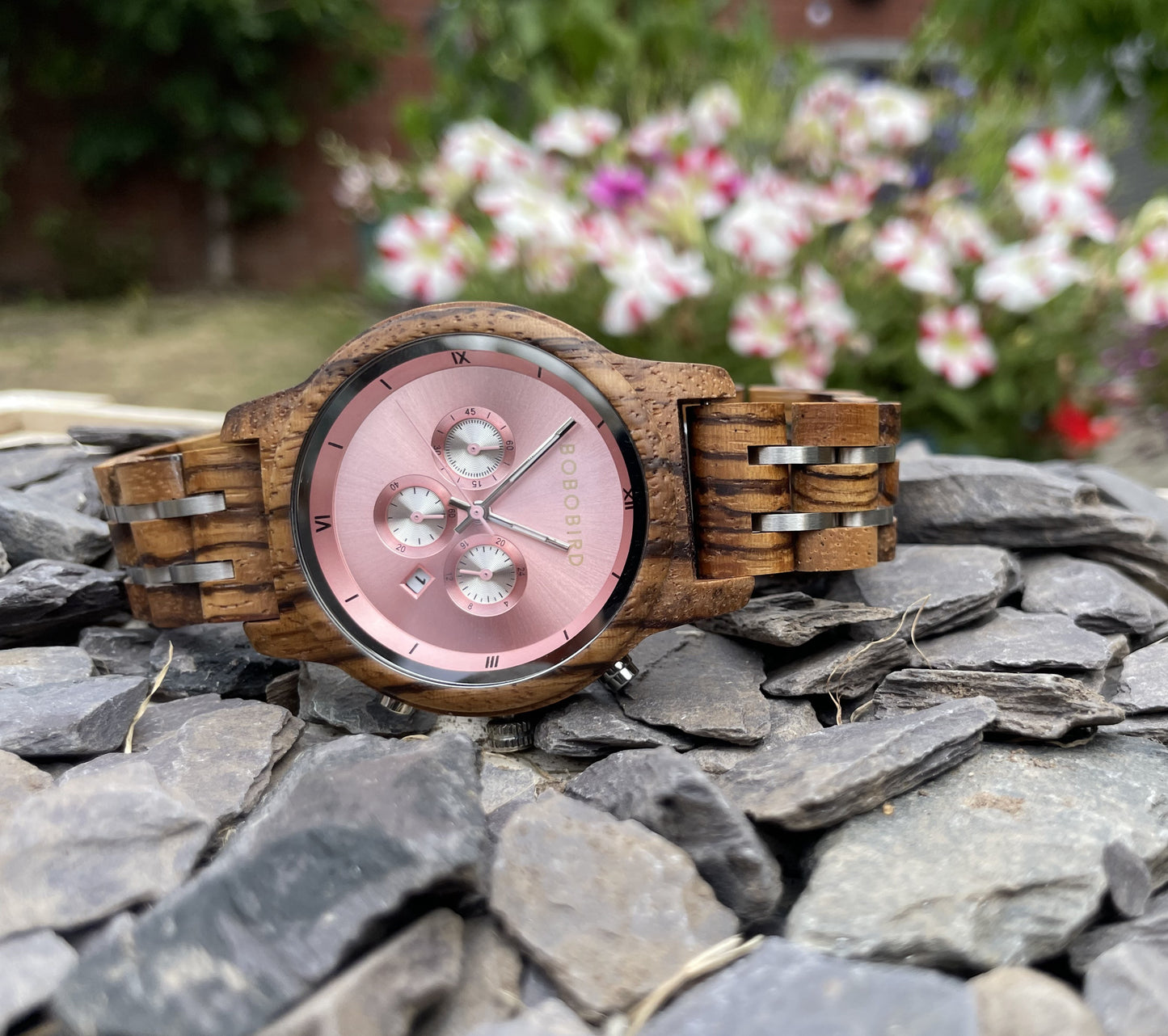 Zebrano & Metal Interlocking Strap Wooden Eco Ladies Watch
Made from solid zebrano, these watches are both comfortable to wear and a unique timepiece. Featuring a zebrano and metal interlocking frame strap along with a rose pink metallic face to create a unique look.