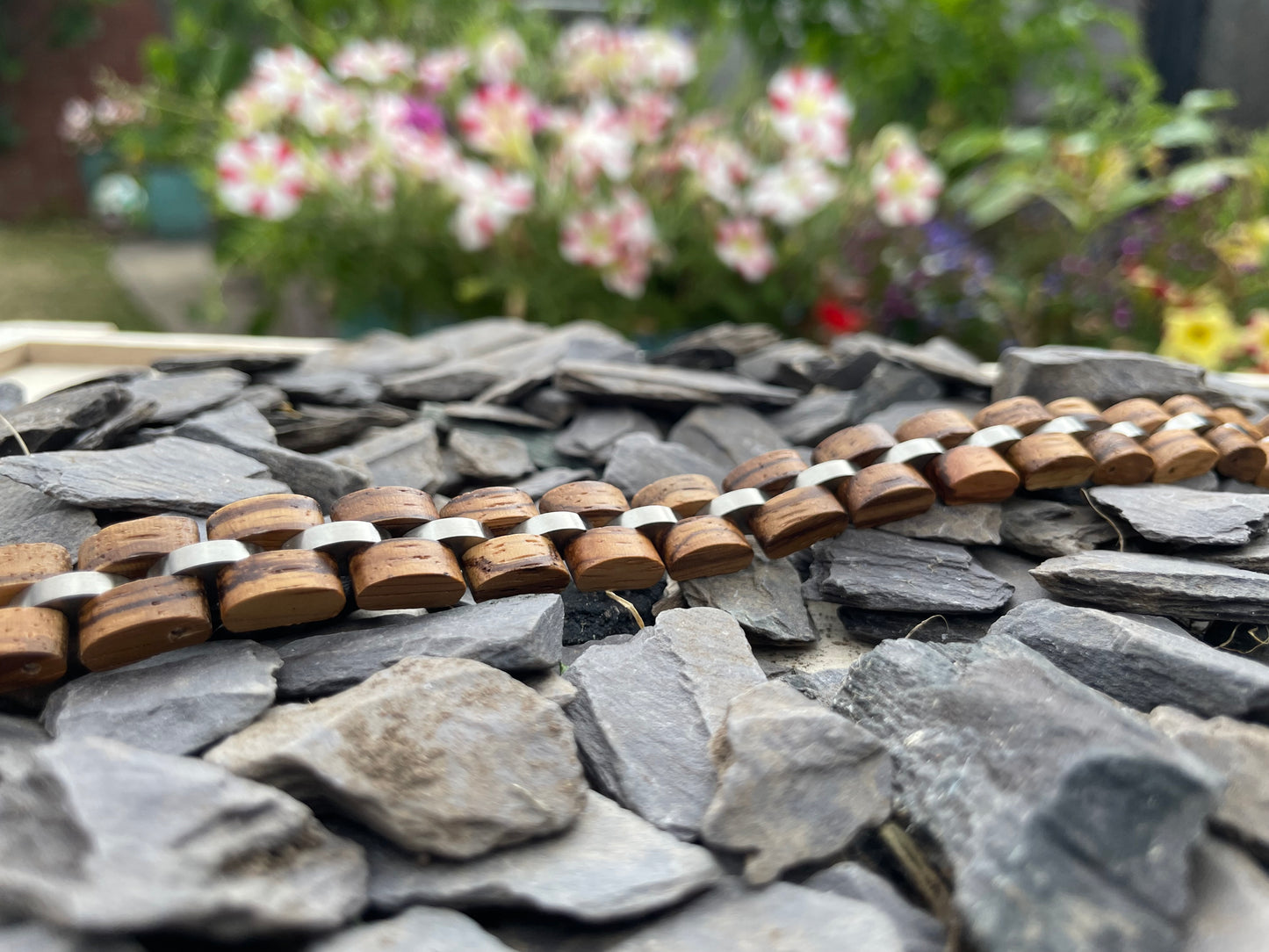 Zebrano and Polished Stainless Steel Bracelet
Made from solid zebrano and highly polished stainless steel; these bracelets are both comfortable to wear and a unique piece of jewellery.